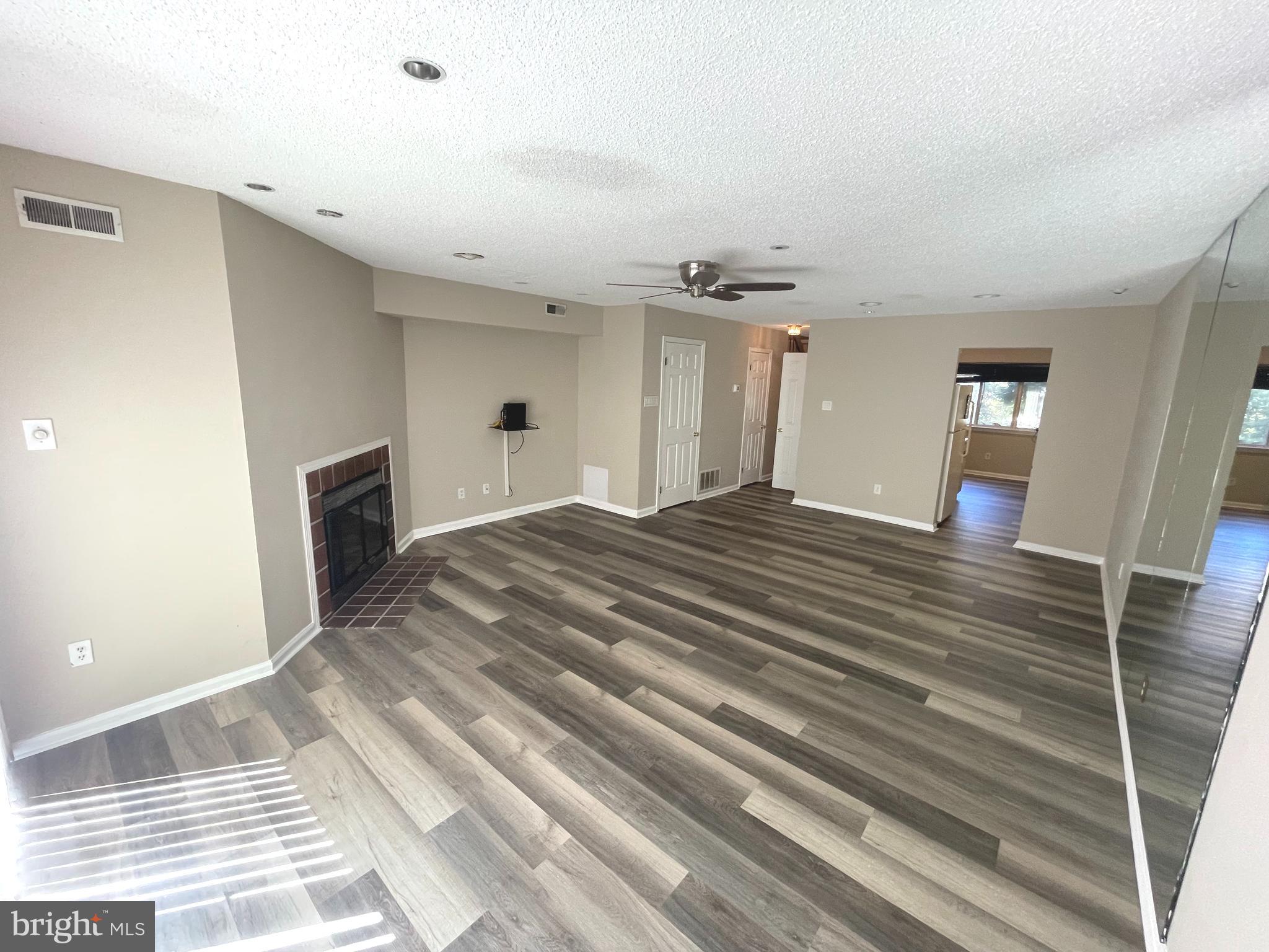 214 Carriage Court, Unit 214 Chesterbrook, PA 19087 - Photo 11 of 41 a view of a livingroom with wooden floor