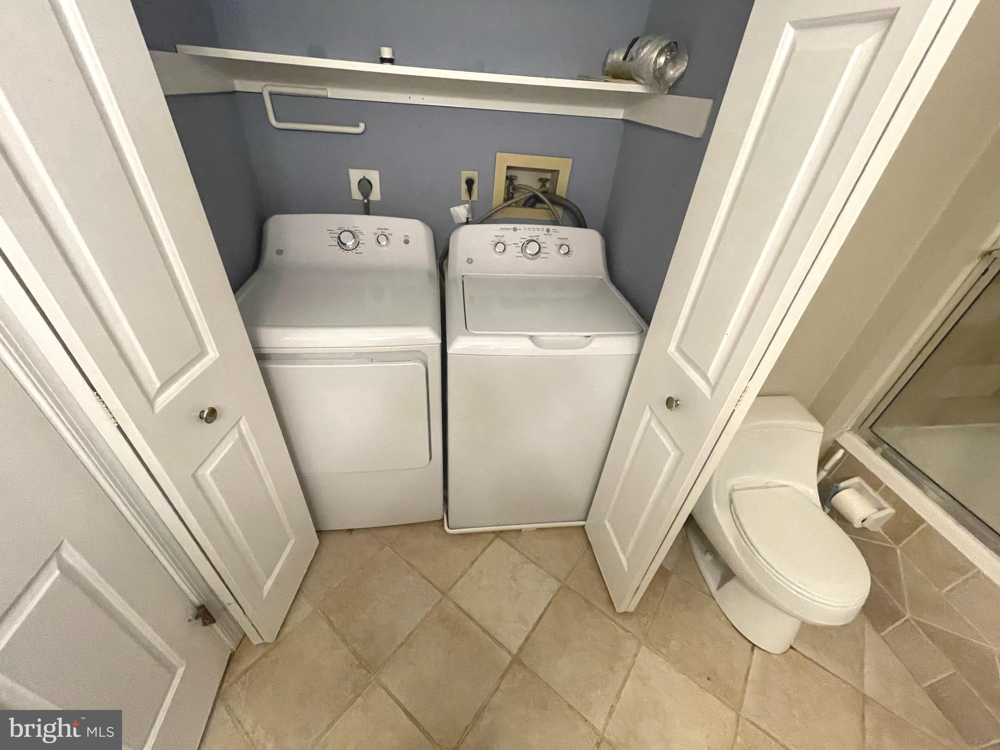 214 Carriage Court, Unit 214 Chesterbrook, PA 19087 - Photo 20 of 41 a utility room with dryer and washer