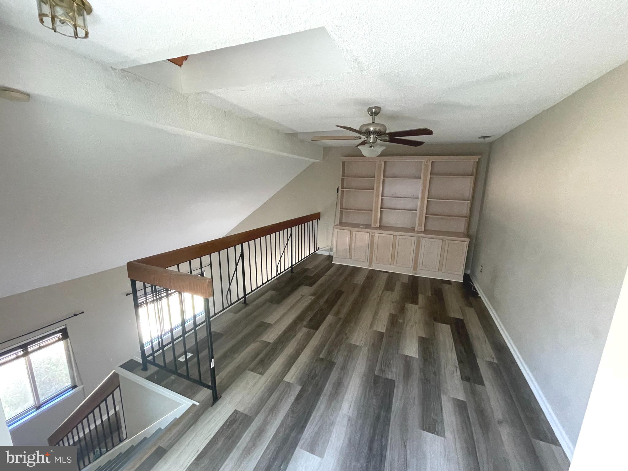 214 Carriage Court, Unit 214 Chesterbrook, PA 19087 - Photo 32 of 41 a view of entryway with wooden floor