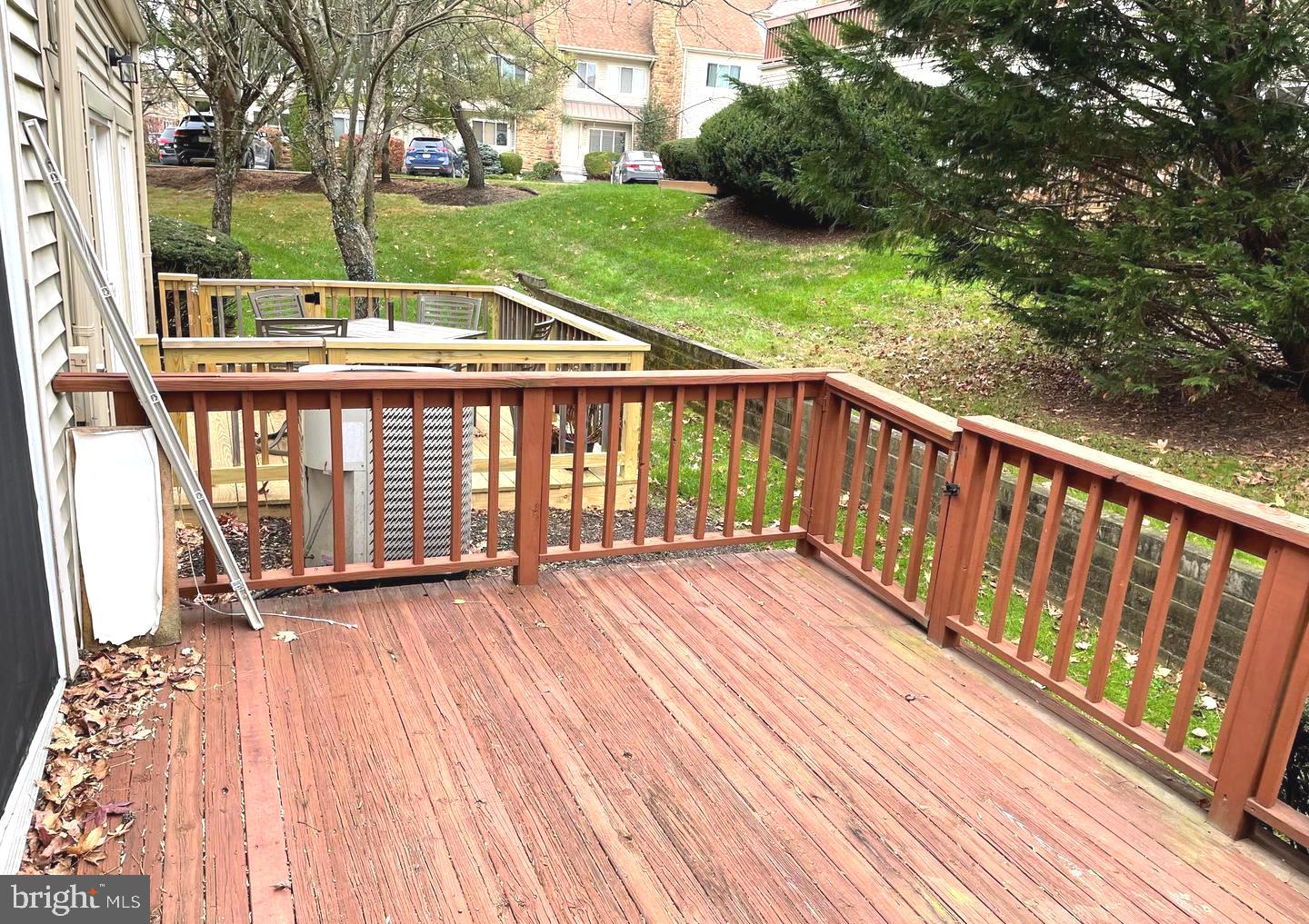 214 Carriage Court, Unit 214 Chesterbrook, PA 19087 - Photo 39 of 41 a view of balcony with wooden floor and fence