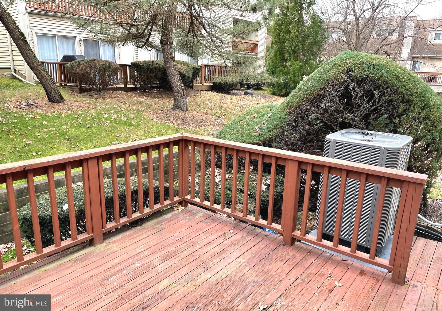 214 Carriage Court, Unit 214 Chesterbrook, PA 19087 - Photo 40 of 41 a view of a deck with two chairs and a table