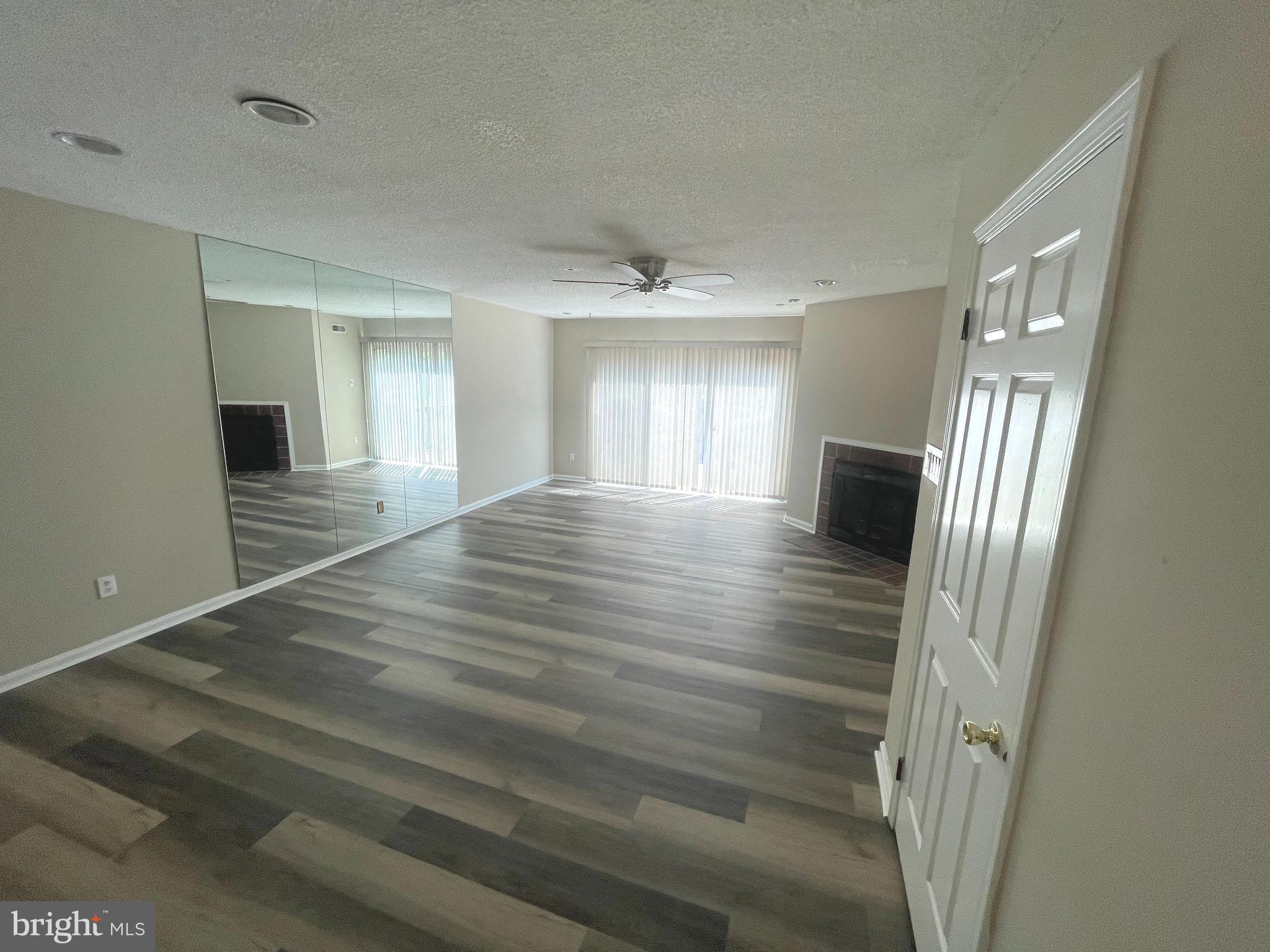 214 Carriage Court, Unit 214 Chesterbrook, PA 19087 - Photo 10 of 41 a view of an empty room and window