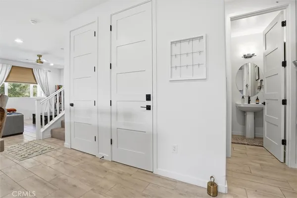 a view of entryway with wooden floor