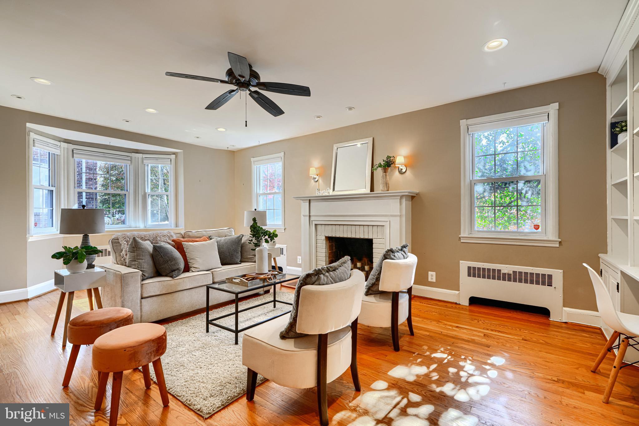 100 Dunkirk Road Baltimore, MD 21212 - Photo 11 of 65 a living room with furniture a fireplace and a window