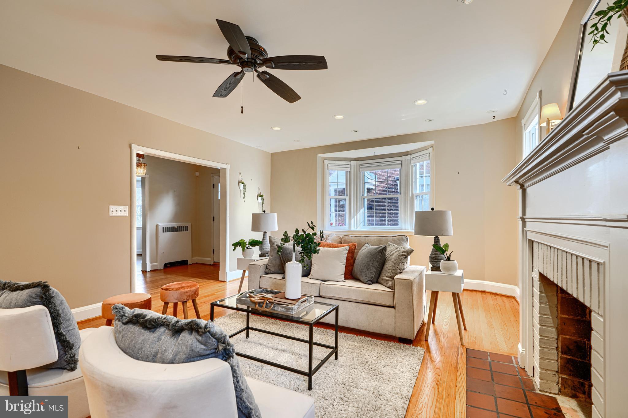 100 Dunkirk Road Baltimore, MD 21212 - Photo 12 of 65 a living room with furniture and a fireplace