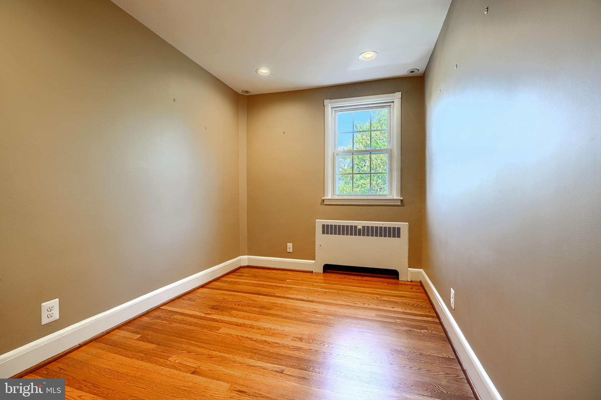 100 Dunkirk Road Baltimore, MD 21212 - Photo 21 of 65 a view of empty room with wooden floor