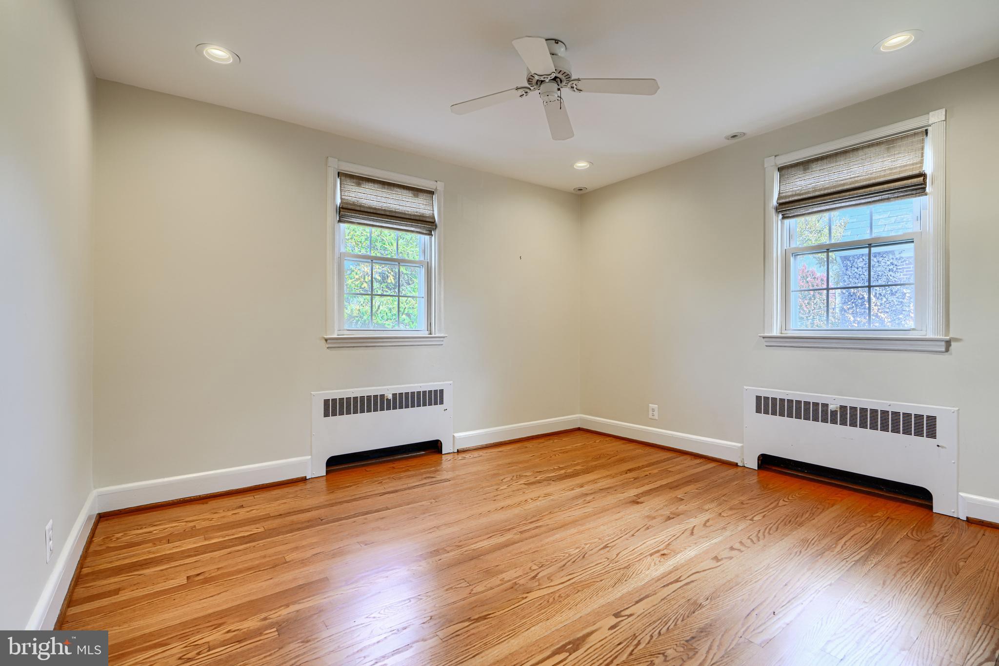 100 Dunkirk Road Baltimore, MD 21212 - Photo 23 of 65 wooden floor in an empty room with a window