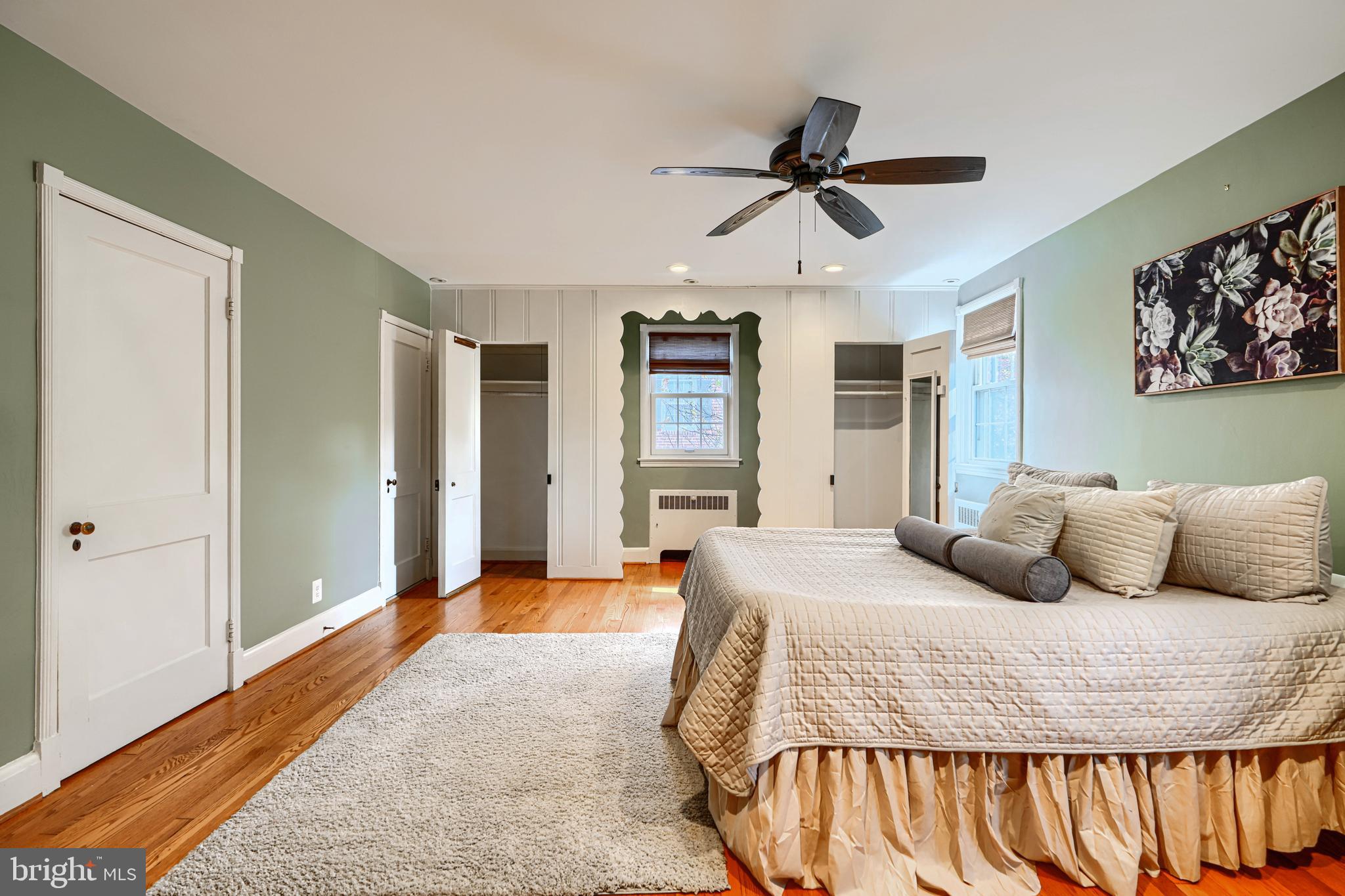 100 Dunkirk Road Baltimore, MD 21212 - Photo 34 of 65 a bedroom with a large bed and a chandelier