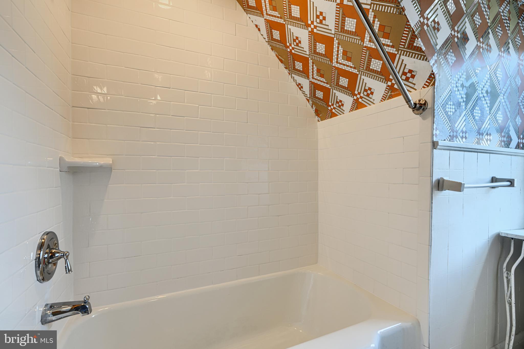 100 Dunkirk Road Baltimore, MD 21212 - Photo 40 of 65 a bathroom with a bathtub and shower