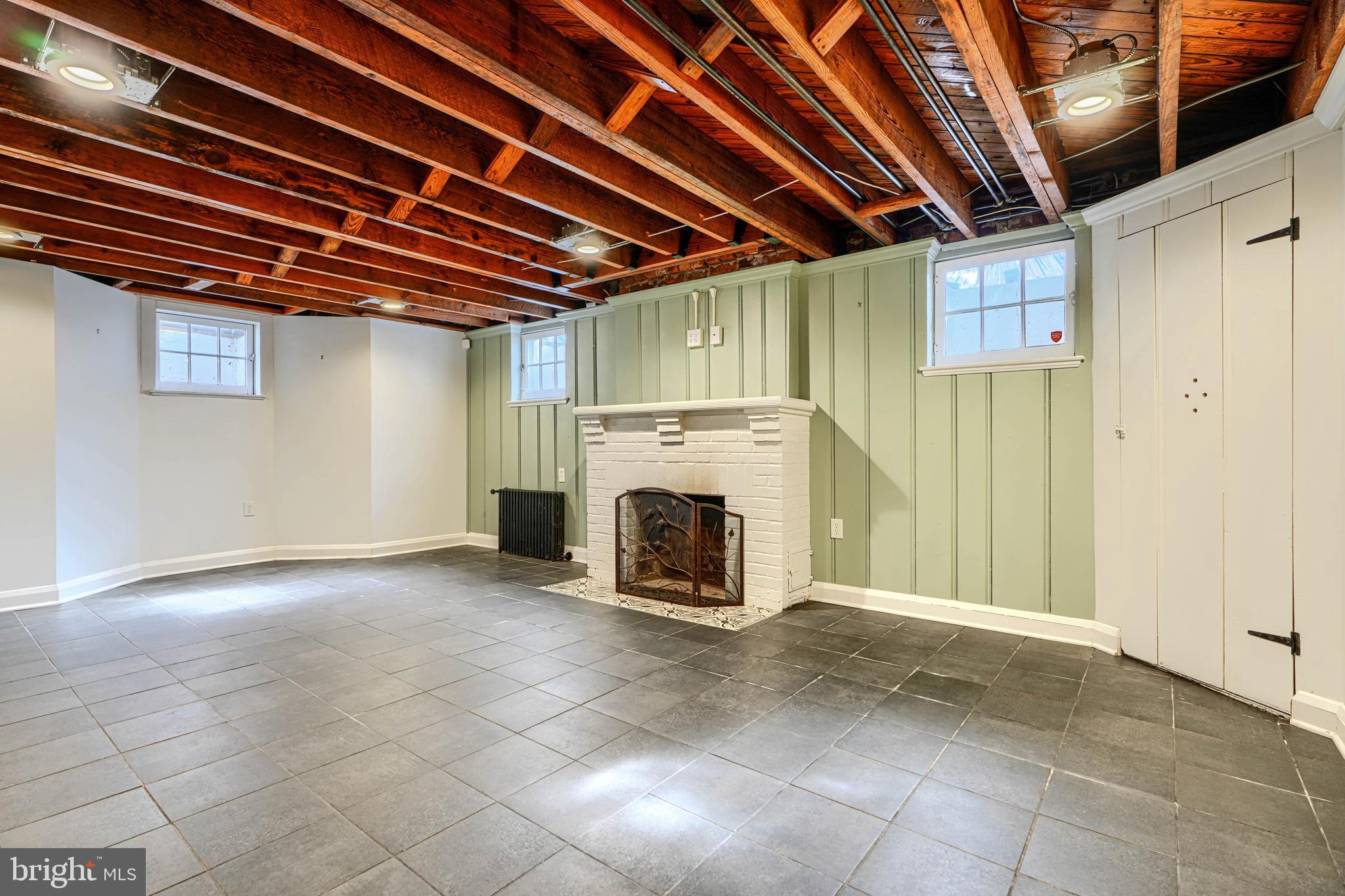 100 Dunkirk Road Baltimore, MD 21212 - Photo 42 of 65 a view of empty room with a fireplace