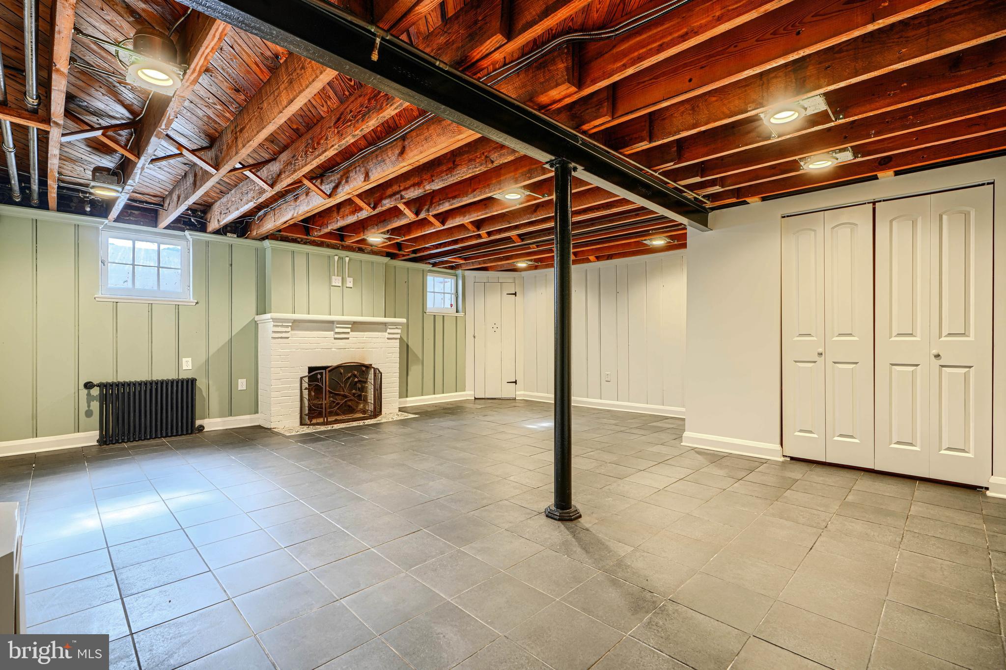 100 Dunkirk Road Baltimore, MD 21212 - Photo 46 of 65 a view of an empty room with a fireplace