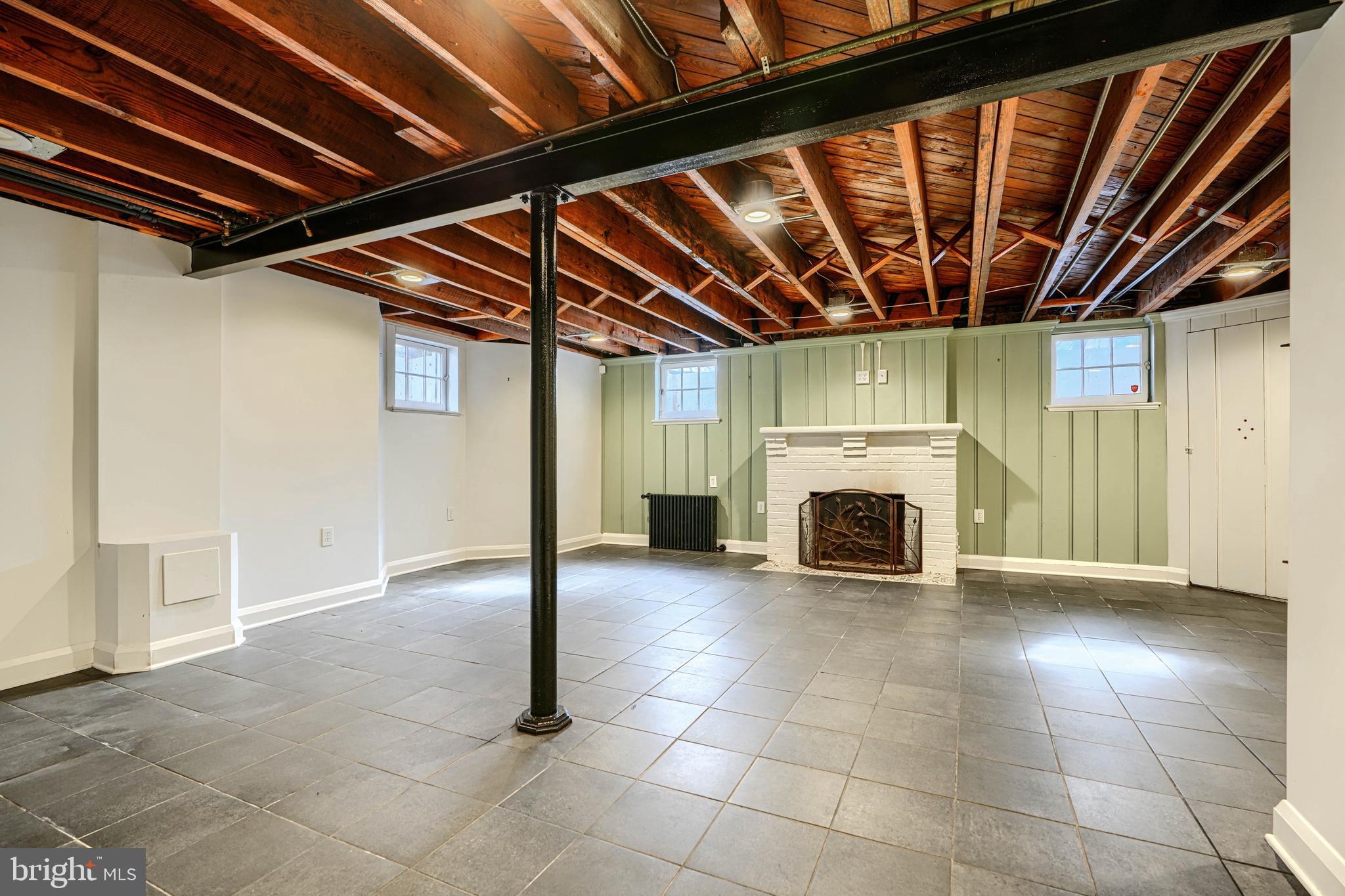 100 Dunkirk Road Baltimore, MD 21212 - Photo 48 of 65 a view of an empty room with a fireplace