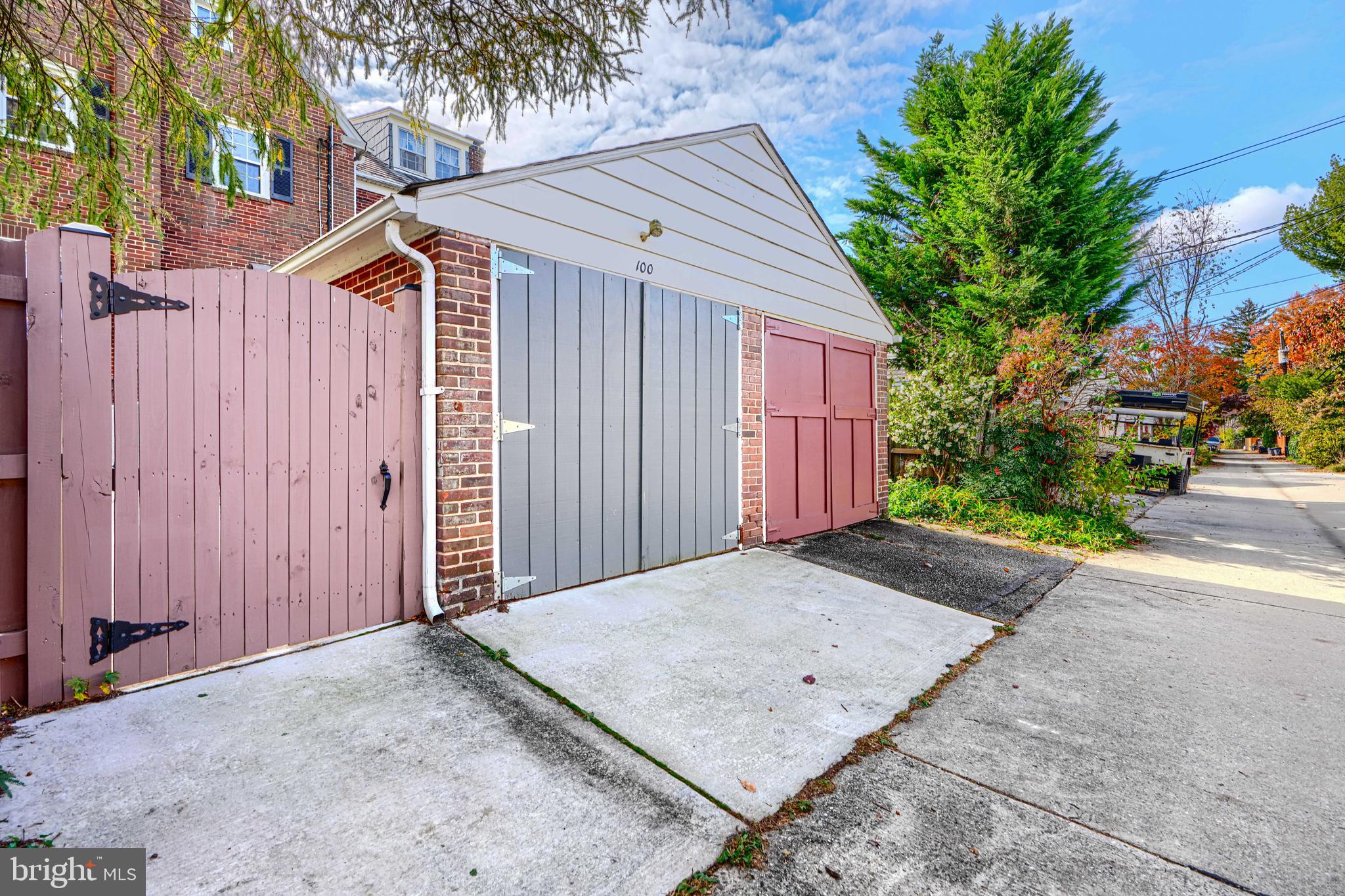 100 Dunkirk Road Baltimore, MD 21212 - Photo 54 of 65 a view of a house with a backyard and garage