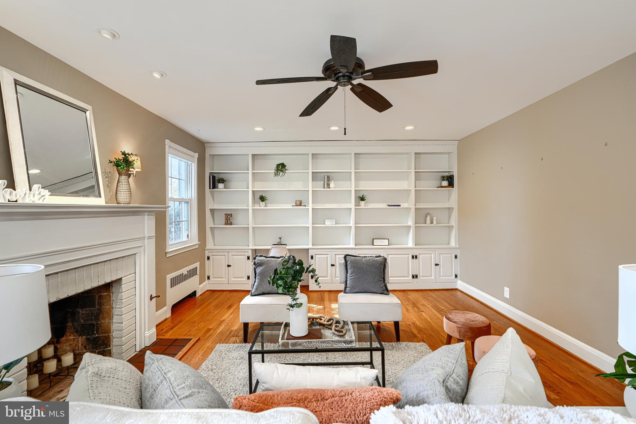 100 Dunkirk Road Baltimore, MD 21212 - Photo 6 of 65 a living room with furniture and a fireplace