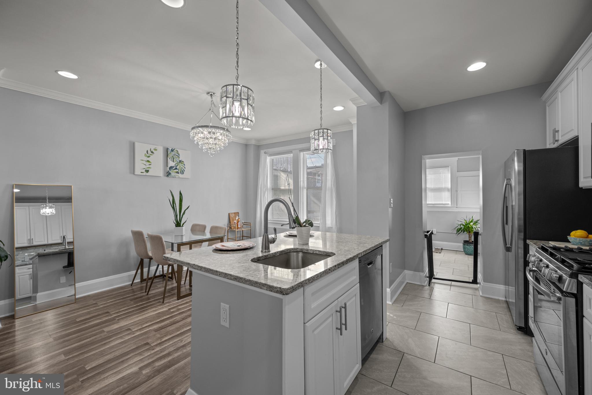 3009 Kentucky Avenue Baltimore, MD 21213 - Photo 12 of 42 a kitchen that has a lot of cabinets in it