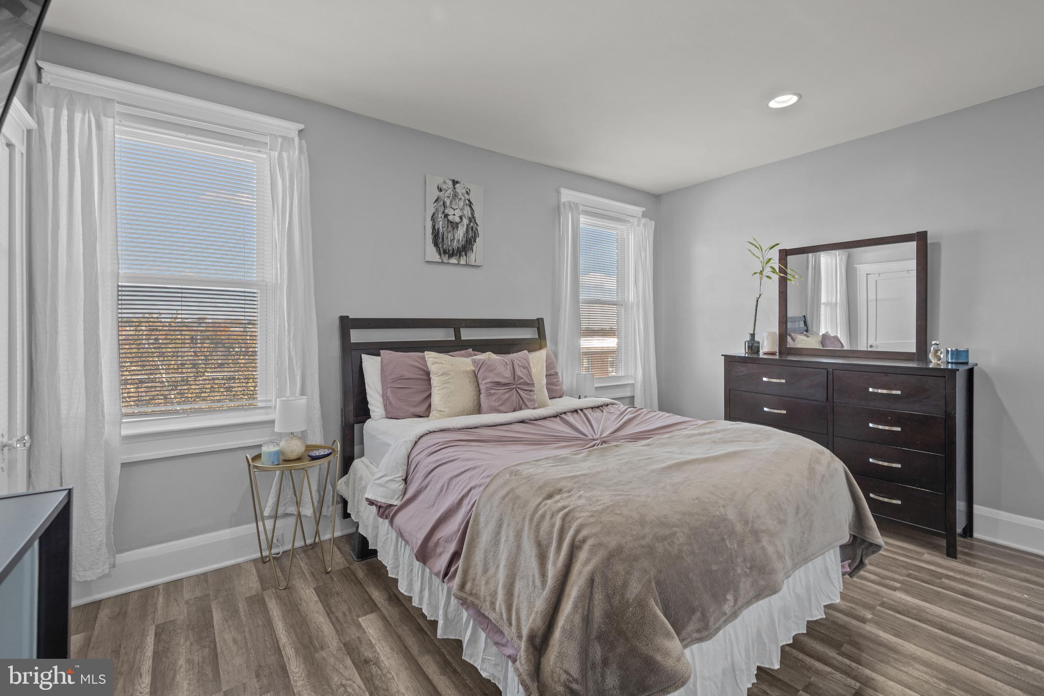 3009 Kentucky Avenue Baltimore, MD 21213 - Photo 16 of 42 a bedroom with a bed and a dresser