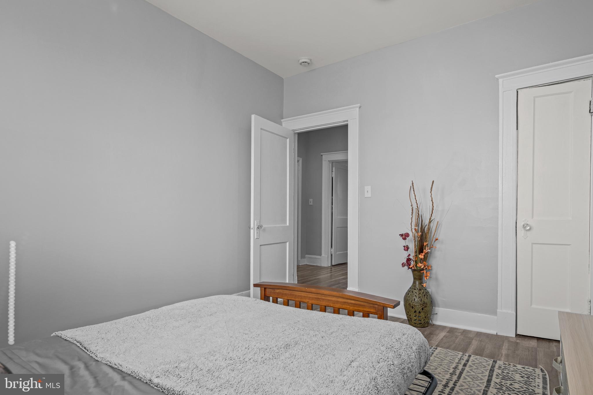 3009 Kentucky Avenue Baltimore, MD 21213 - Photo 21 of 42 a bedroom with a bed and a table