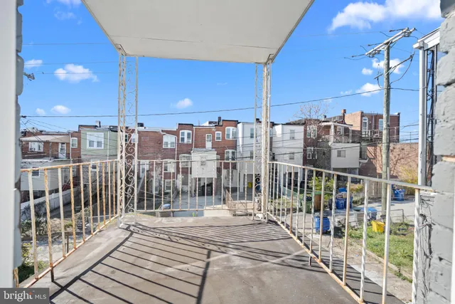 a view of a balcony with city view