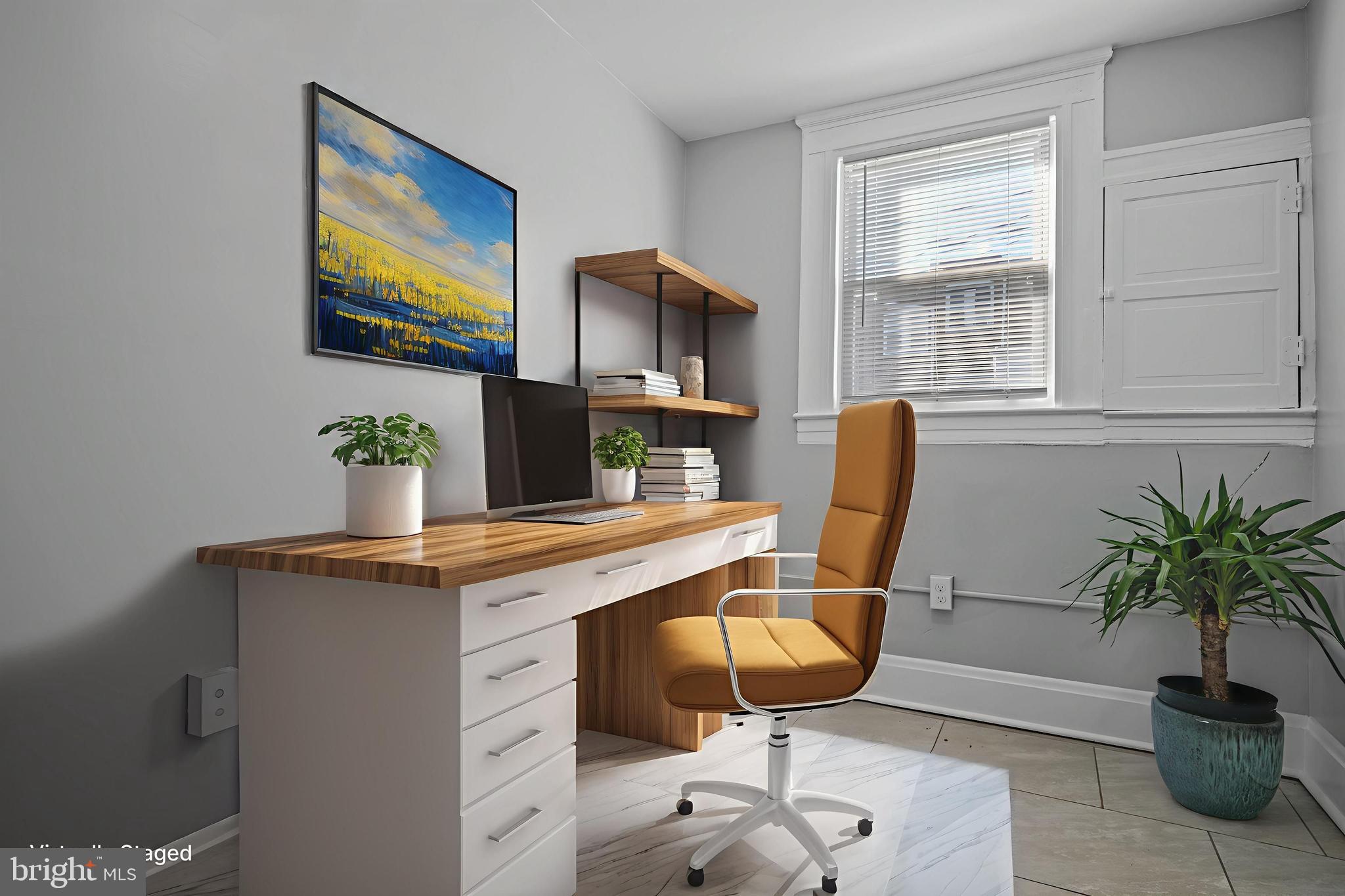 3009 Kentucky Avenue Baltimore, MD 21213 - Photo 25 of 42 a workspace with furniture and potted plant