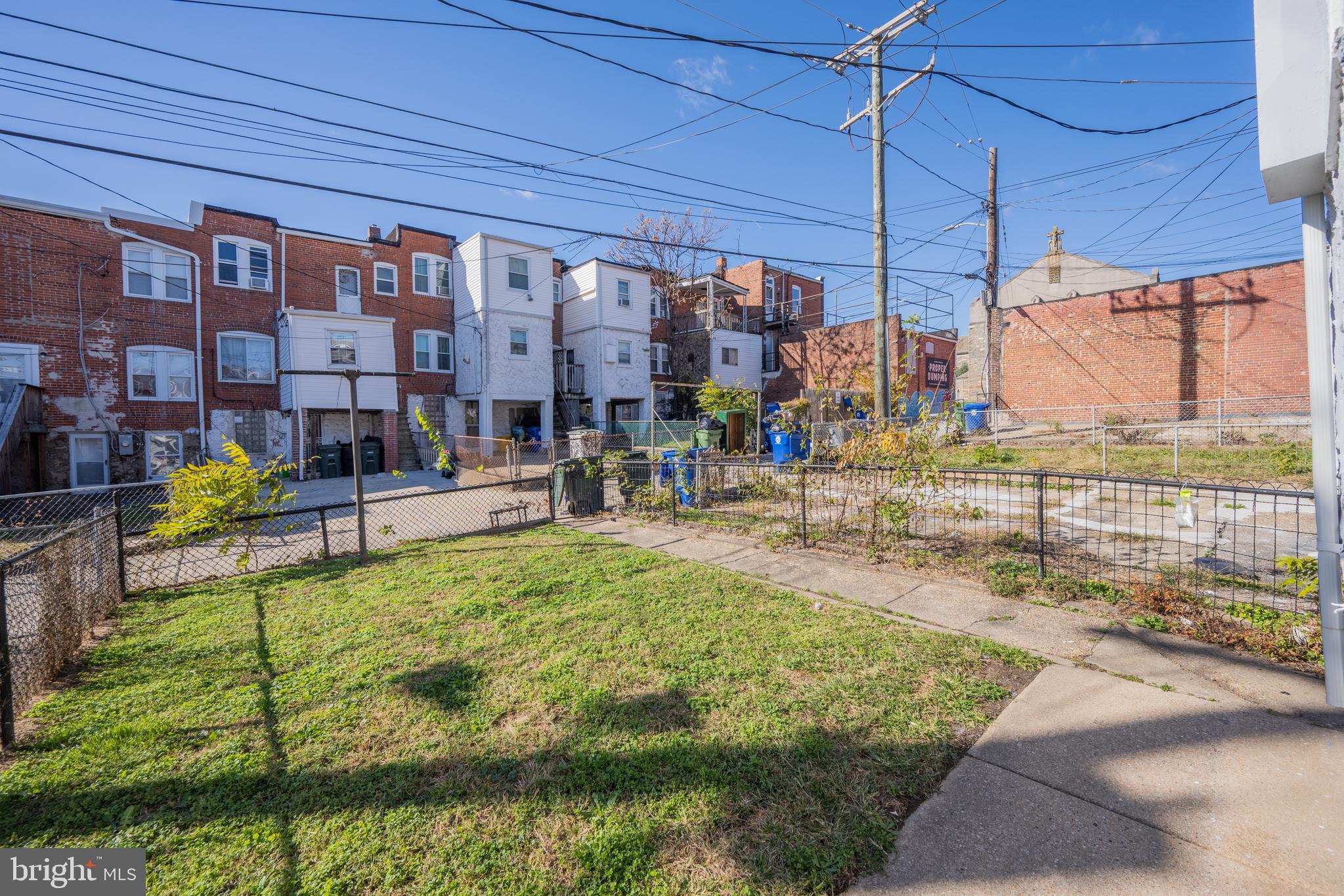 3009 Kentucky Avenue Baltimore, MD 21213 - Photo 34 of 42 a swimming pool with outdoor seating and yard