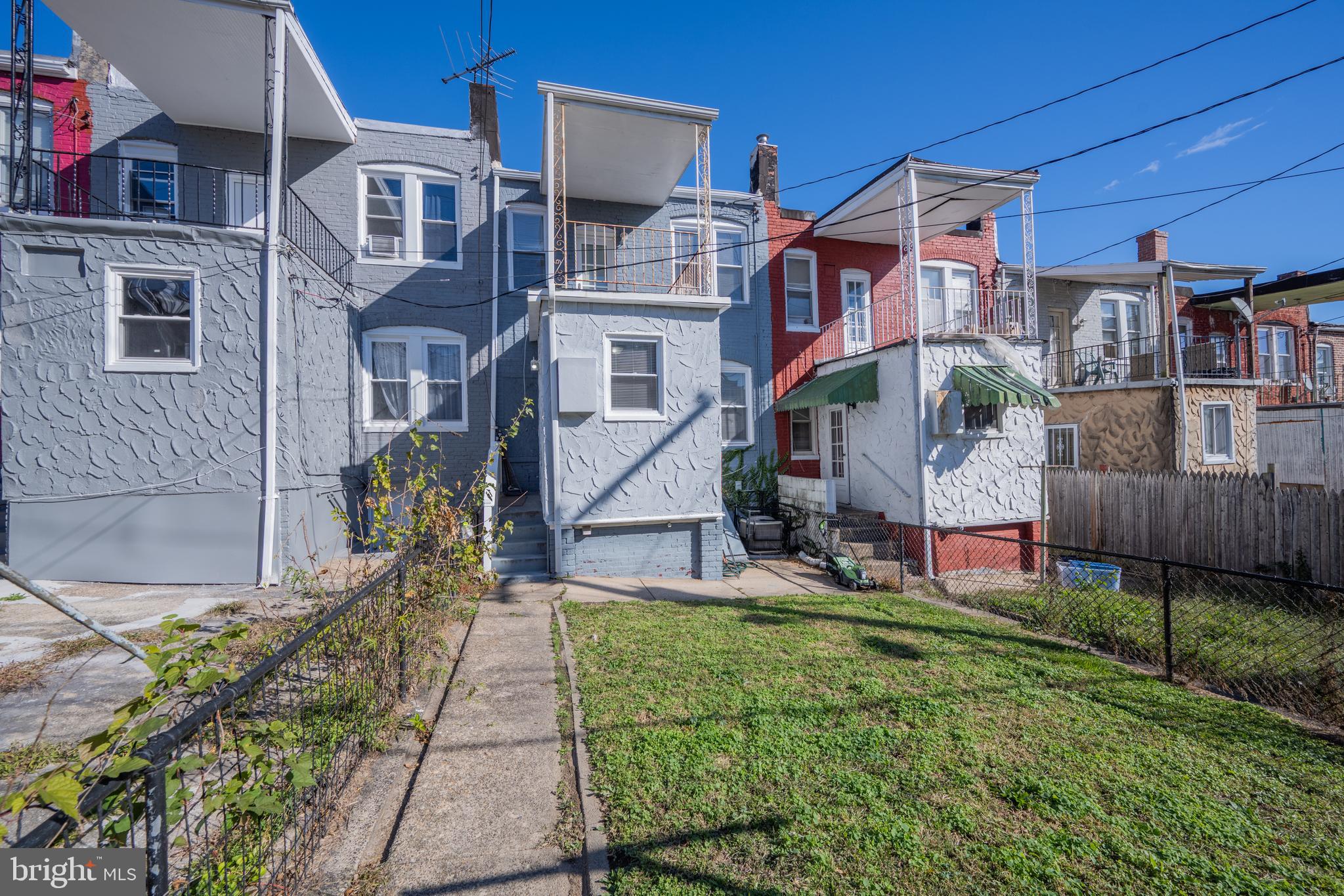 3009 Kentucky Avenue Baltimore, MD 21213 - Photo 35 of 42 front view of a house with a yard