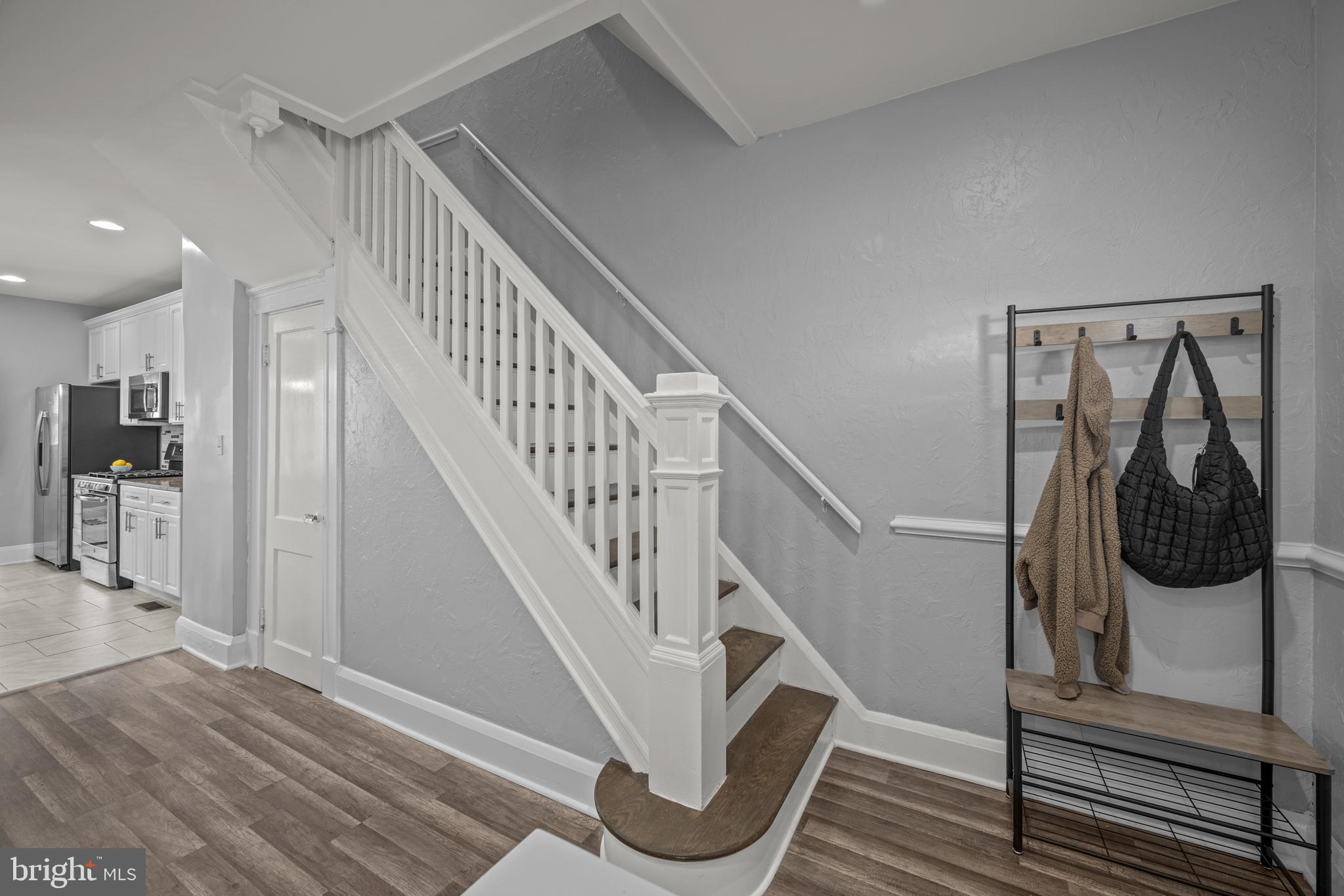 3009 Kentucky Avenue Baltimore, MD 21213 - Photo 4 of 42 a view of entryway and hall with wooden floor