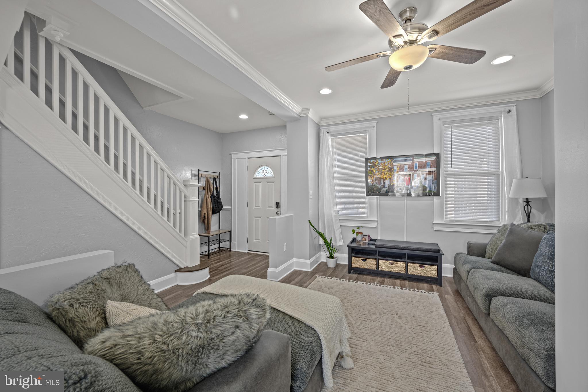 3009 Kentucky Avenue Baltimore, MD 21213 - Photo 6 of 42 a living room with furniture and a wooden floor