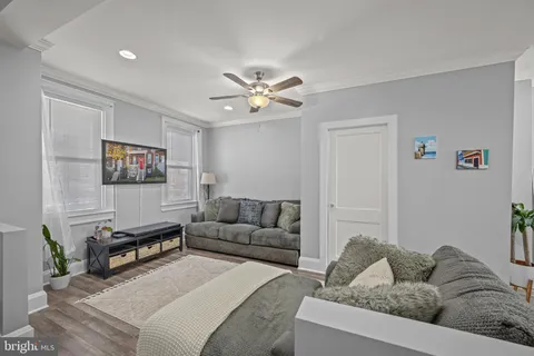 a living room with furniture and a couch