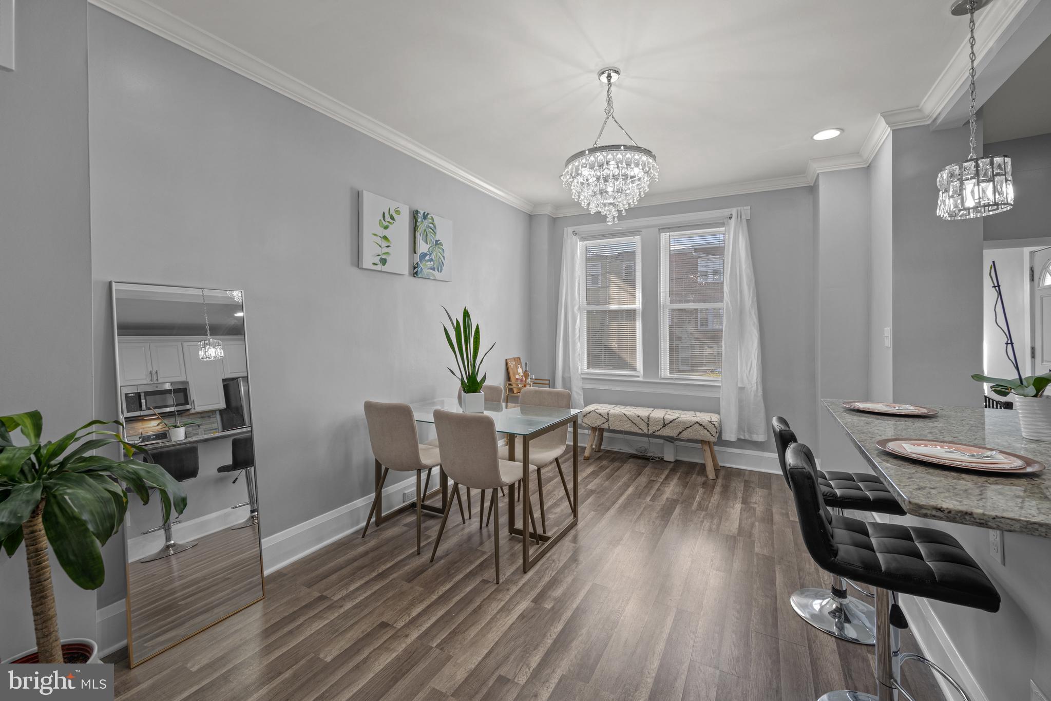 3009 Kentucky Avenue Baltimore, MD 21213 - Photo 9 of 42 a view of a dining room with furniture window and wooden floor