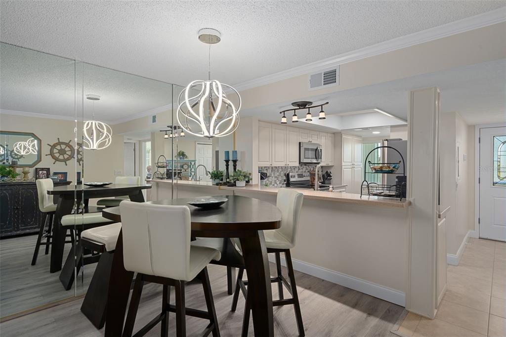 4550 Bay Boulevard, Unit 1211 Port Richey, FL 34668 - Photo 8 of 65 a view of a dining room and livingroom