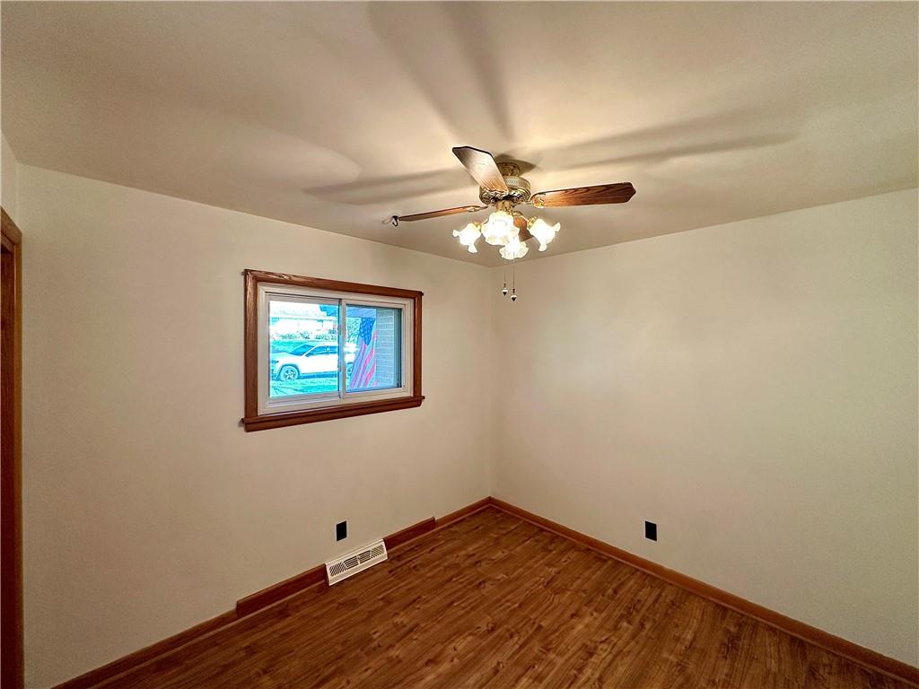 3025 Spring Garden Avenue New Castle, PA 16105 - Photo 24 of 37 a view of an empty room with chandelier fan