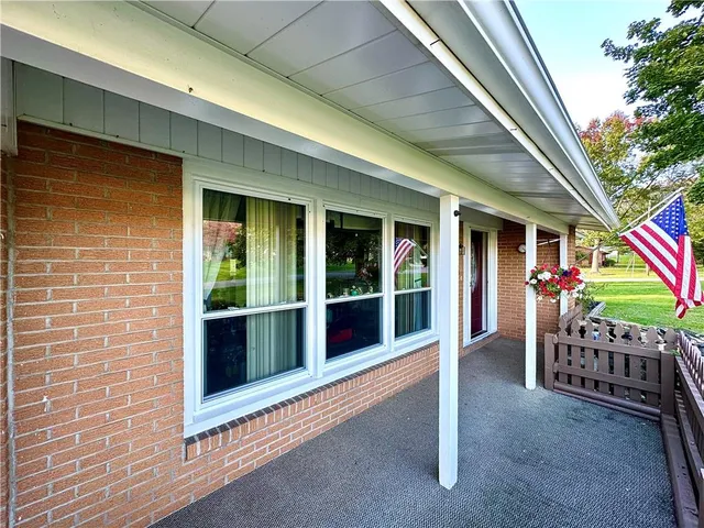 a view of an entryway with seating space