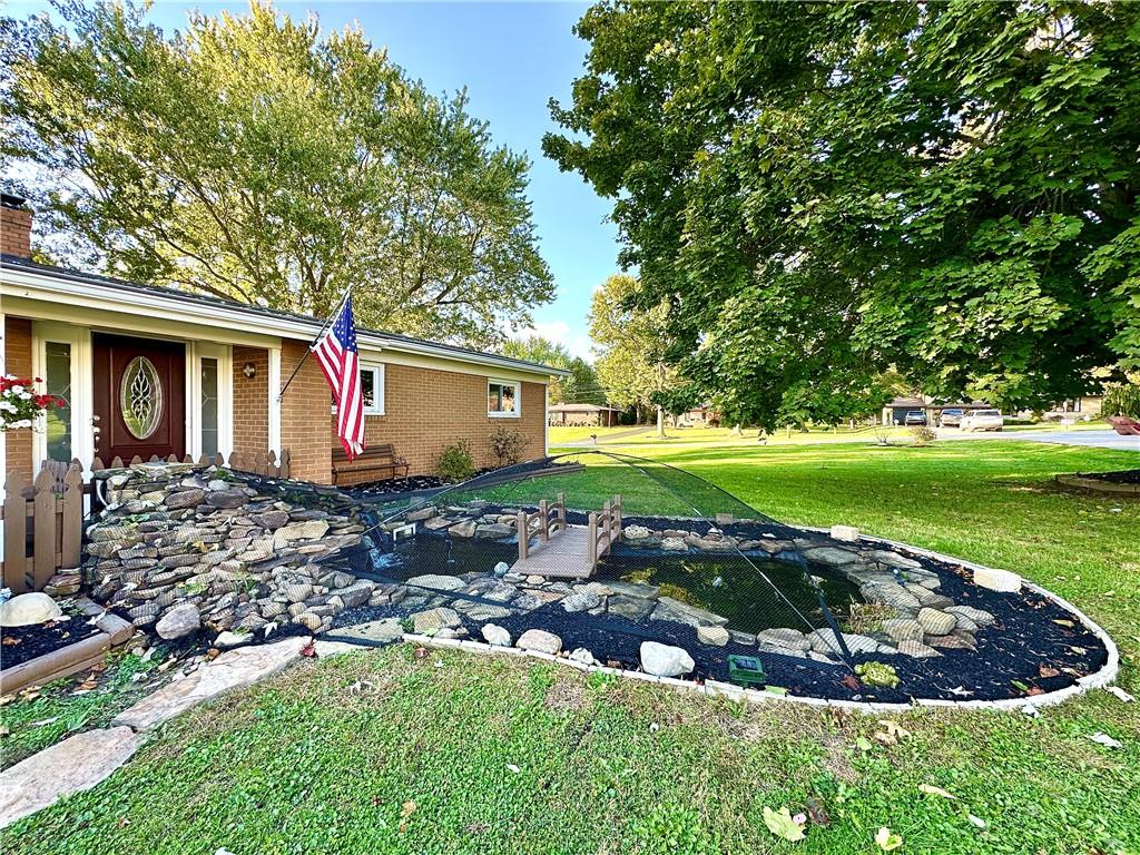 3025 Spring Garden Avenue New Castle, PA 16105 - Photo 5 of 37 a view of a house with backyard and sitting area