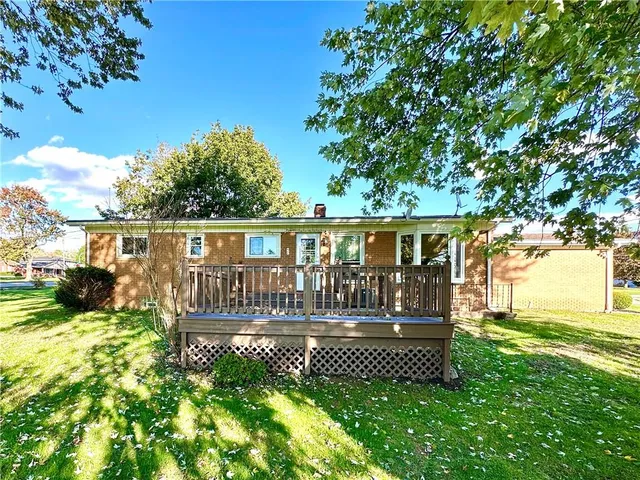front view of a house with a big yard