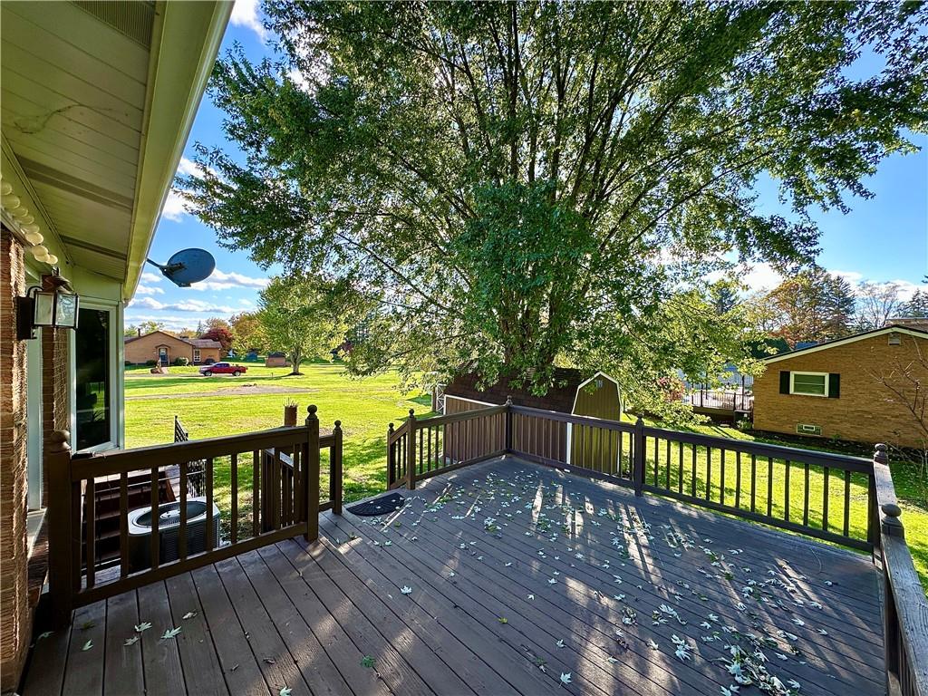 3025 Spring Garden Avenue New Castle, PA 16105 - Photo 10 of 37 a view of a deck with chairs next to a yard