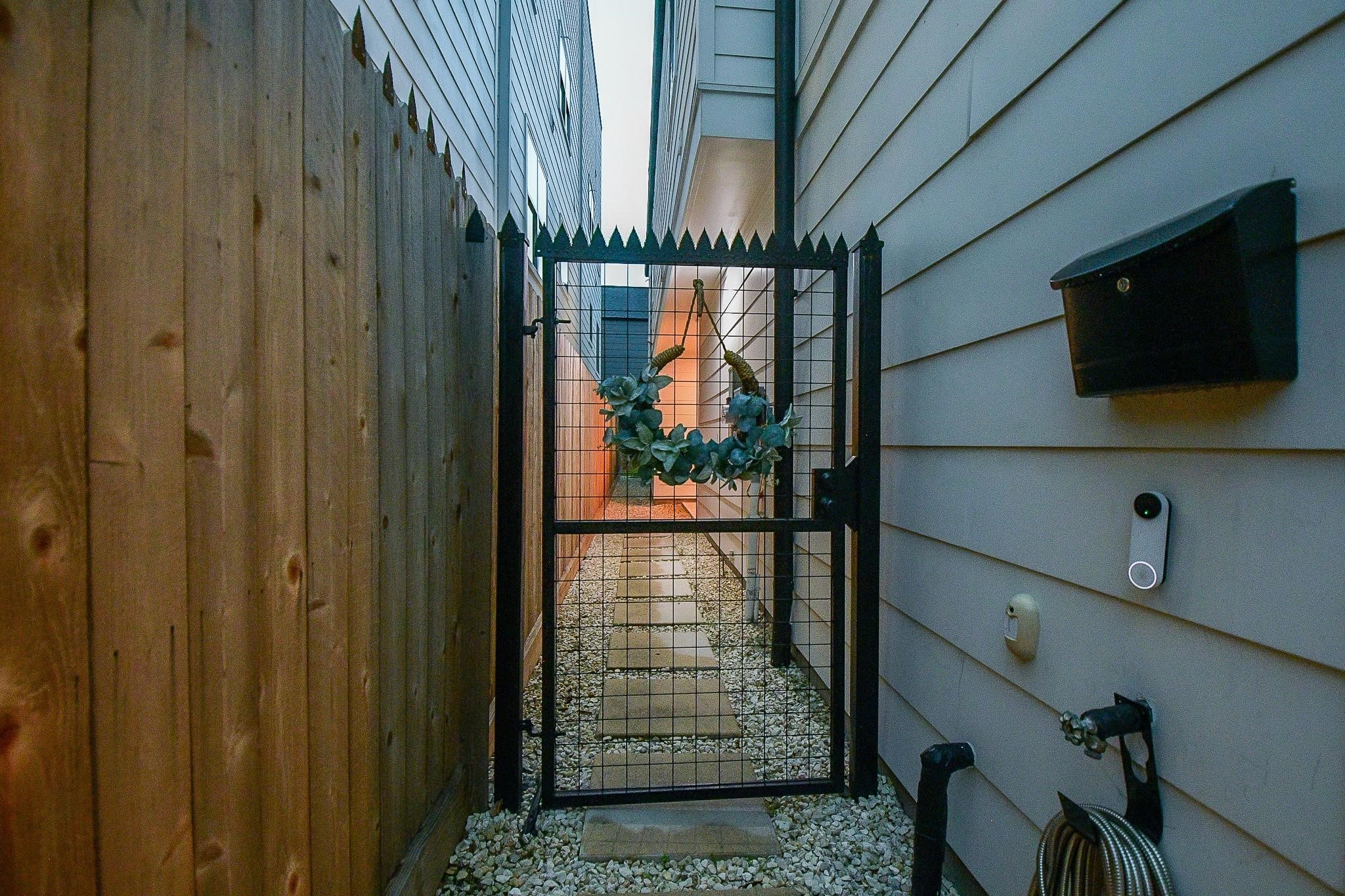 4403 Greeley Street Houston, TX 77006 - Photo 2 of 28 a view of entryway with a flat screen tv