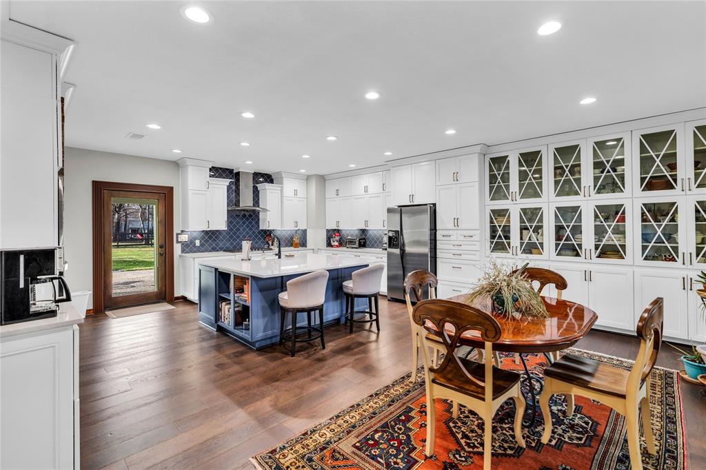 304 North Church Street Pilot Point, TX 76258 - Photo 12 of 40 a living room with furniture and a wooden floor