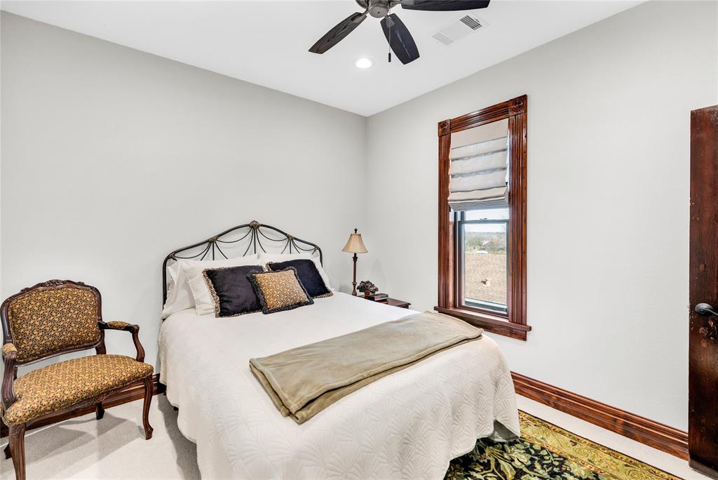 304 North Church Street Pilot Point, TX 76258 - Photo 24 of 40 a bedroom with a bed and window