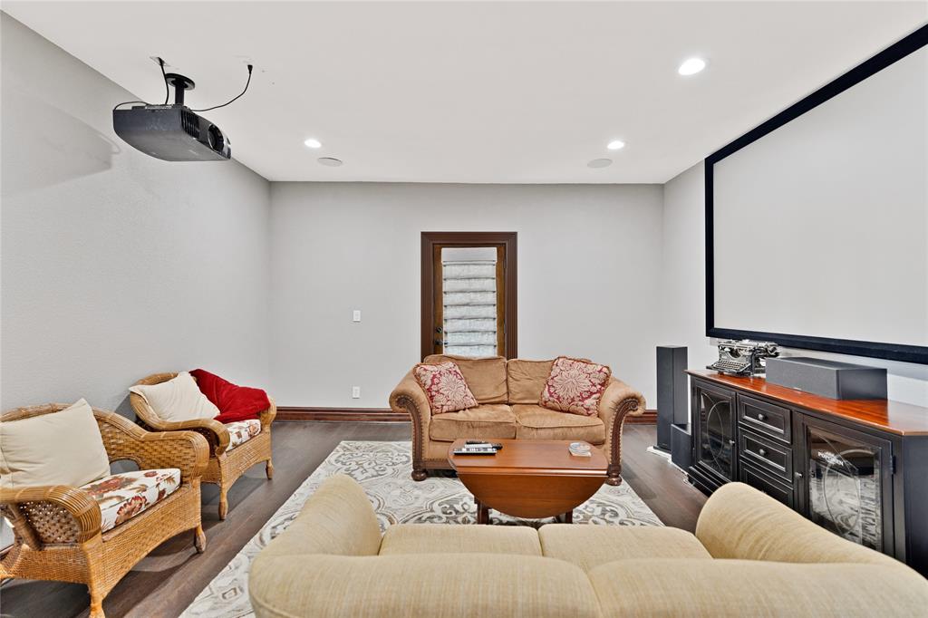 304 North Church Street Pilot Point, TX 76258 - Photo 25 of 40 a living room with furniture rug and a flat screen tv