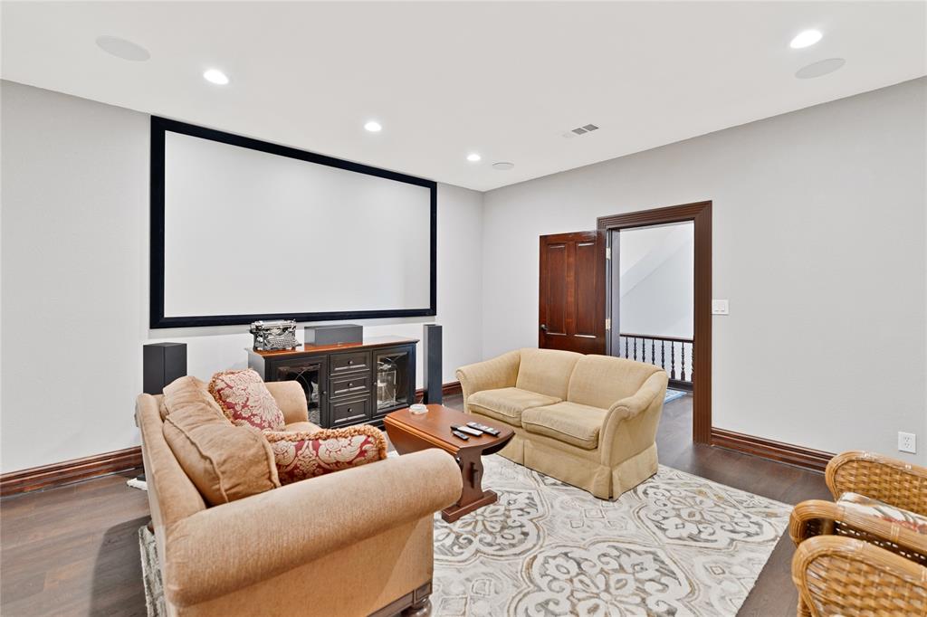 304 North Church Street Pilot Point, TX 76258 - Photo 26 of 40 a living room with furniture and a flat screen tv