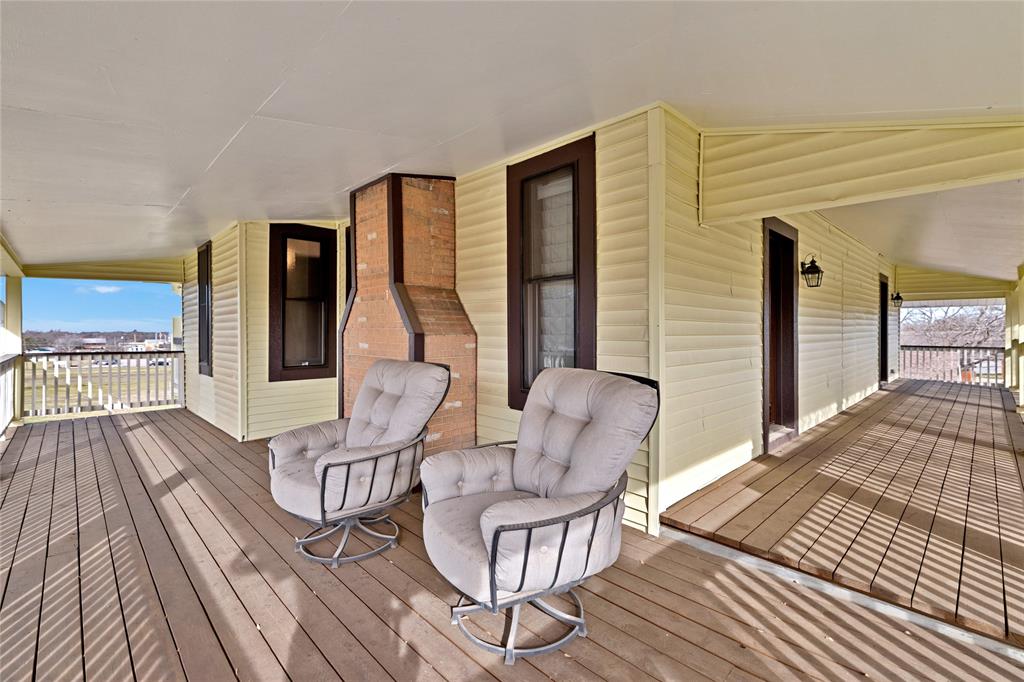304 North Church Street Pilot Point, TX 76258 - Photo 37 of 40 a view of a livingroom with furniture window and wooden floor