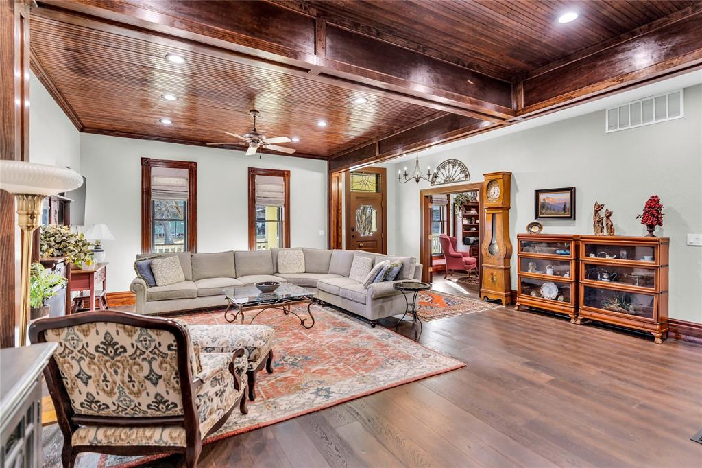304 North Church Street Pilot Point, TX 76258 - Photo 9 of 40 a living room with furniture and a wooden floor