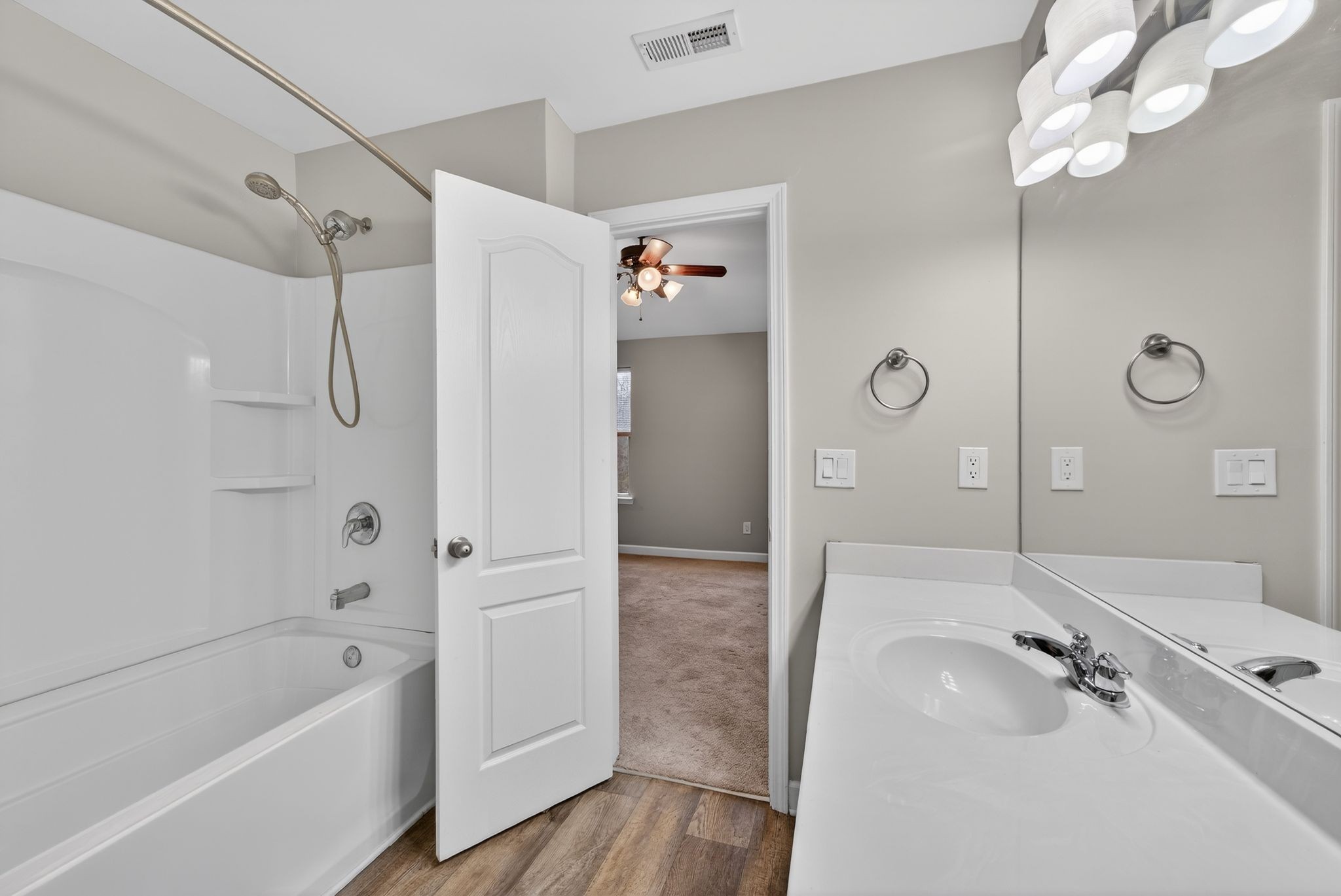 735 Tulip Grove Road, Unit 358 Hermitage, TN 37076 - Photo 18 of 37 a bathroom with a tub a sink and shower