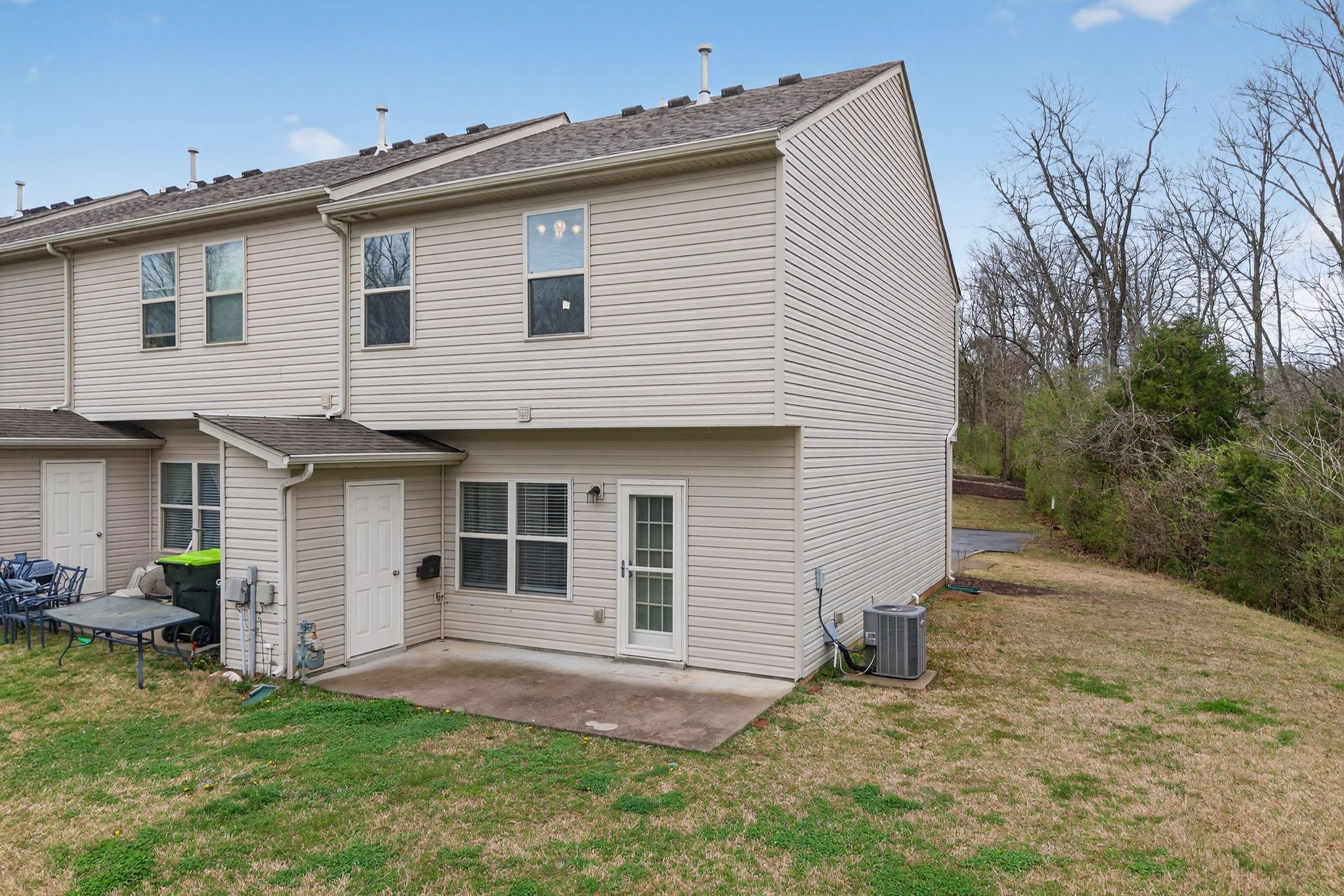 735 Tulip Grove Road, Unit 358 Hermitage, TN 37076 - Photo 26 of 37 a front view of a house with a yard