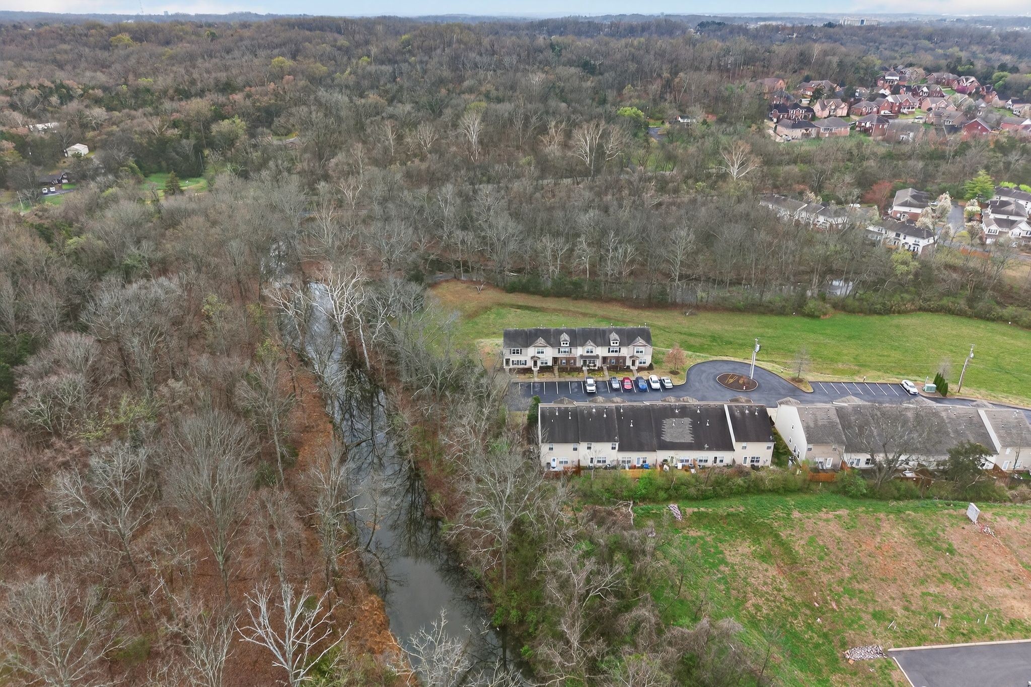 735 Tulip Grove Road, Unit 358 Hermitage, TN 37076 - Photo 32 of 37 a view of a house with a yard