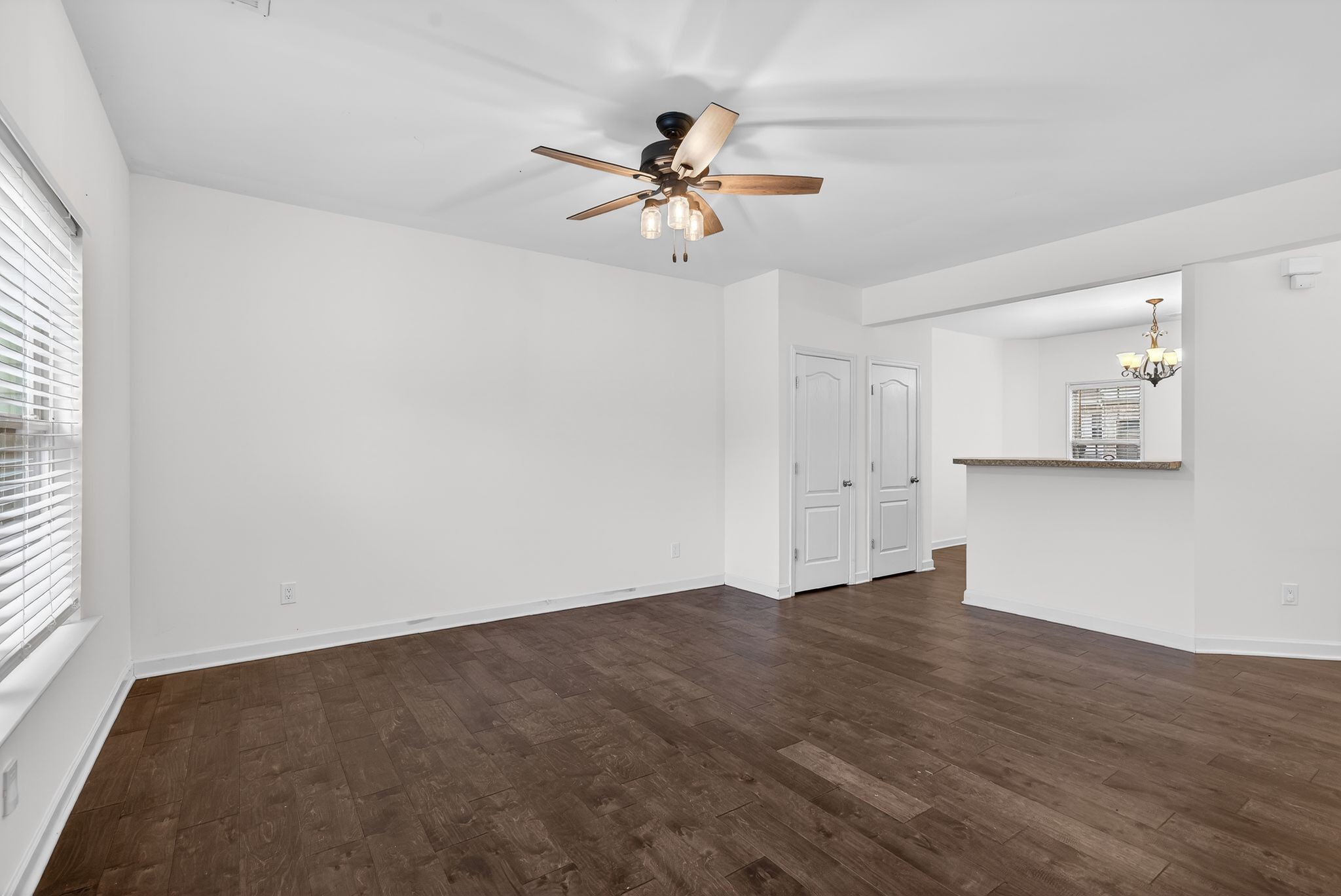 735 Tulip Grove Road, Unit 358 Hermitage, TN 37076 - Photo 8 of 37 wooden floor in an empty room with a window