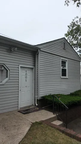 a front view of a house with garage