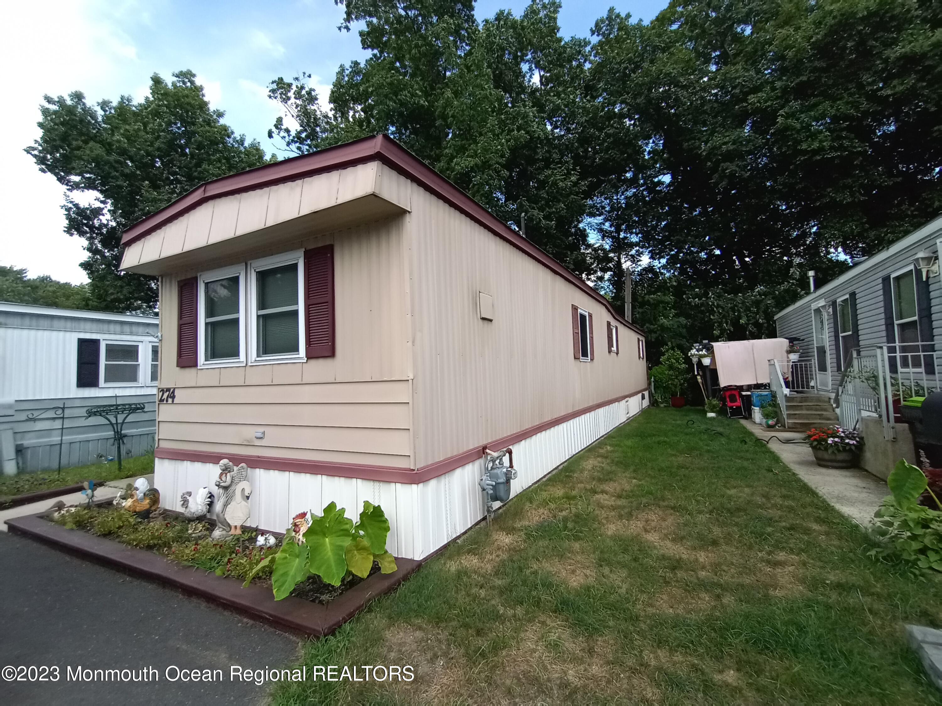 274 Lane C Hazlet, NJ 07730 - Photo 15 of 19 a view of a house with backyard