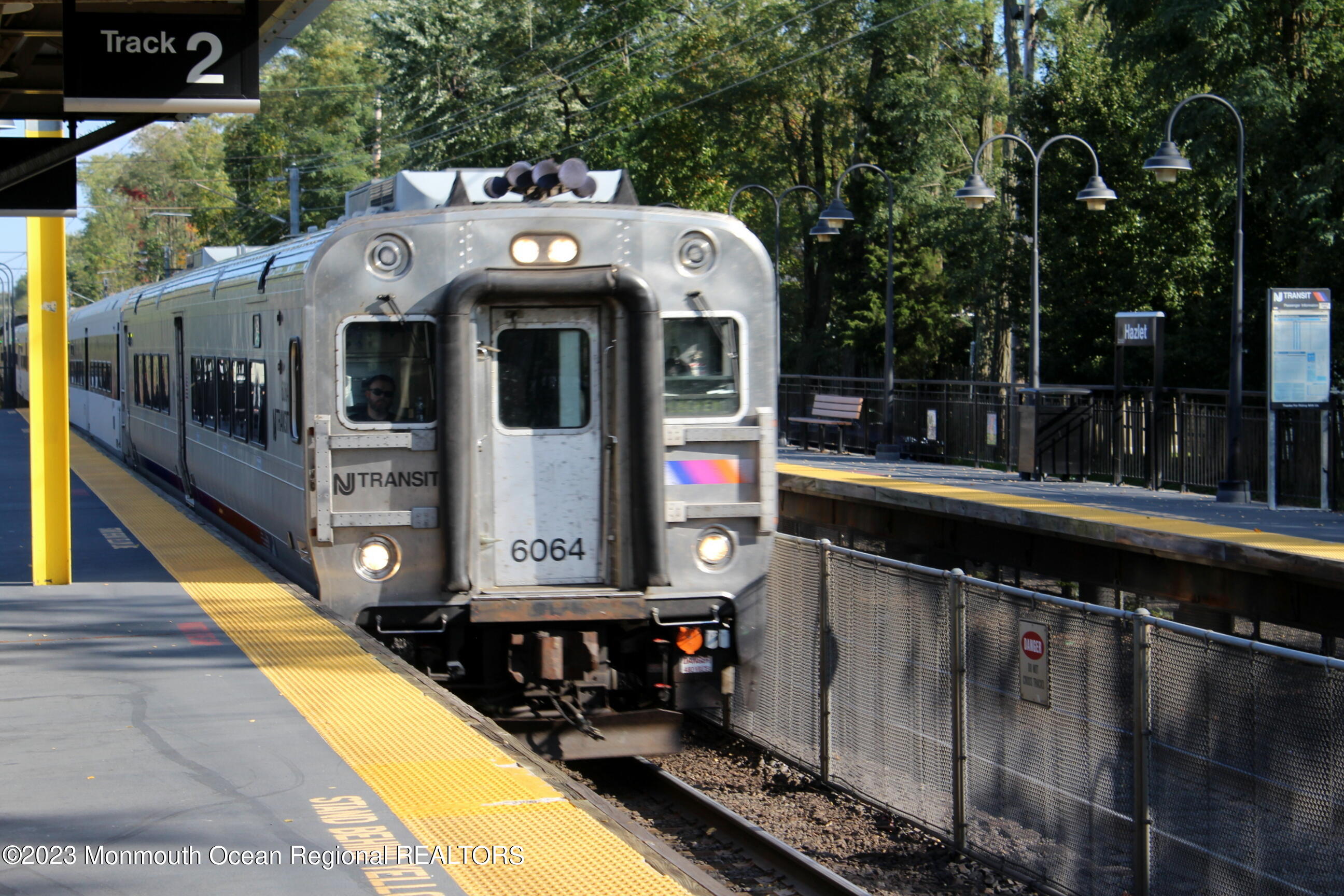 274 Lane C Hazlet, NJ 07730 - Photo 17 of 19 a front view of a house with a yard