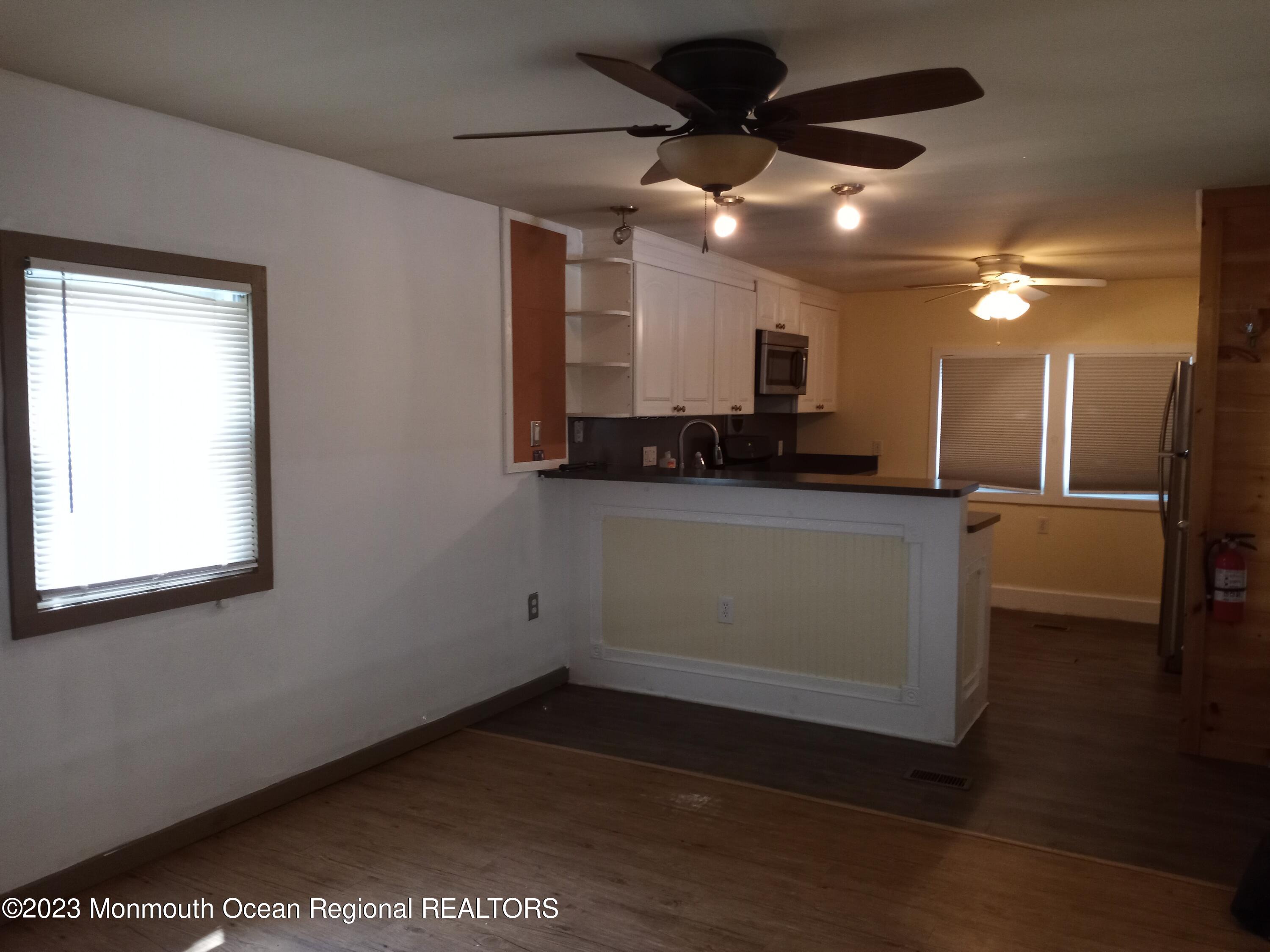 274 Lane C Hazlet, NJ 07730 - Photo 8 of 19 a view of a kitchen with a sink and a dishwasher